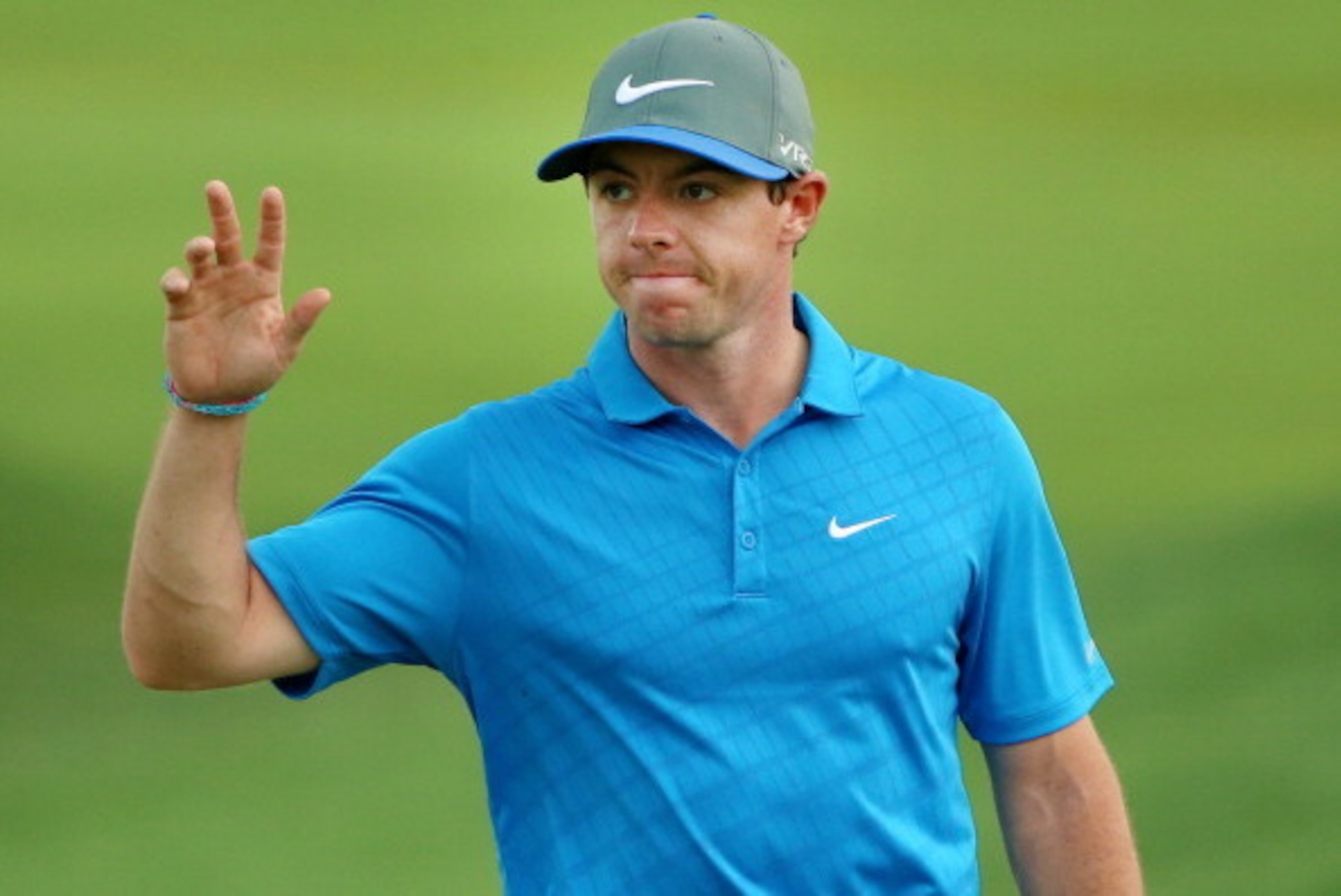 LOUISVILLE, KY - AUGUST 09:  Rory McIlroy of Northern Ireland waves on the 18th green during the third round of the 96th PGA Championship at Valhalla Golf Club on August 9, 2014 in Louisville, Kentucky.  (Photo by Andrew Redington/Getty Images)