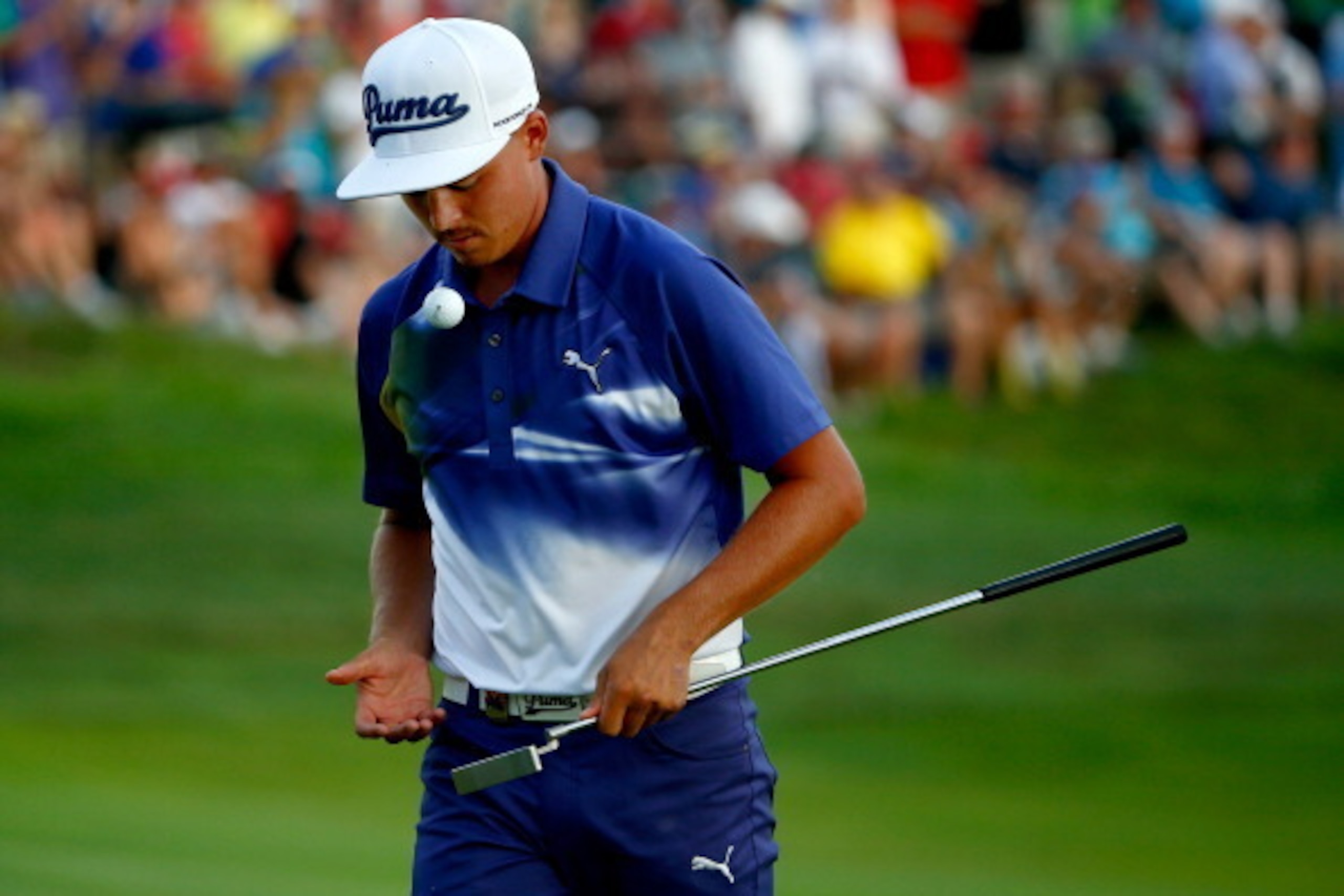LOUISVILLE, KY - AUGUST 09:  Rickie Fowler of the United States walks across the18th green during the third round of the 96th PGA Championship at Valhalla Golf Club on August 9, 2014 in Louisville, Kentucky.  (Photo by Sam Greenwood/Getty Images)