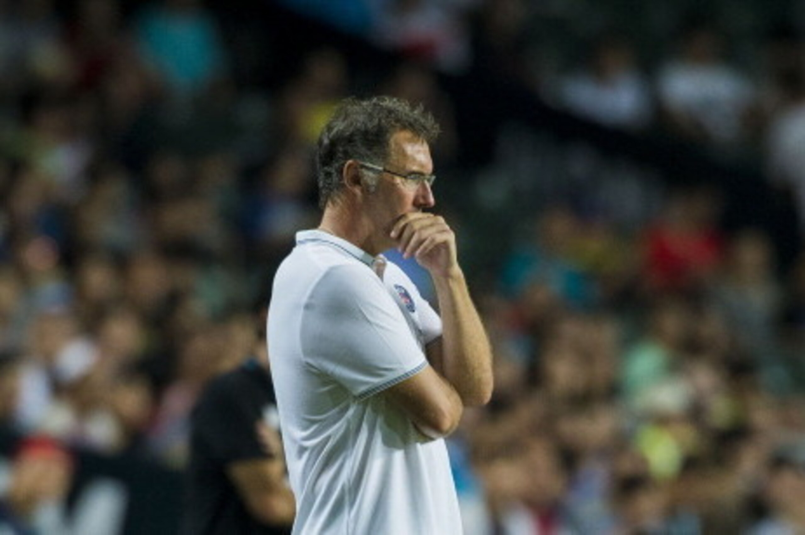HONG KONG - JULY 29:  Paris Saint-Germain head coach Laurent Blanc watches to his players during the match between Kitchee and Paris Saint-Germain at Hong Kong Stadium on July 29, 2014 in Hong Kong, Hong Kong.  (Photo by Victor Fraile/Getty Images)