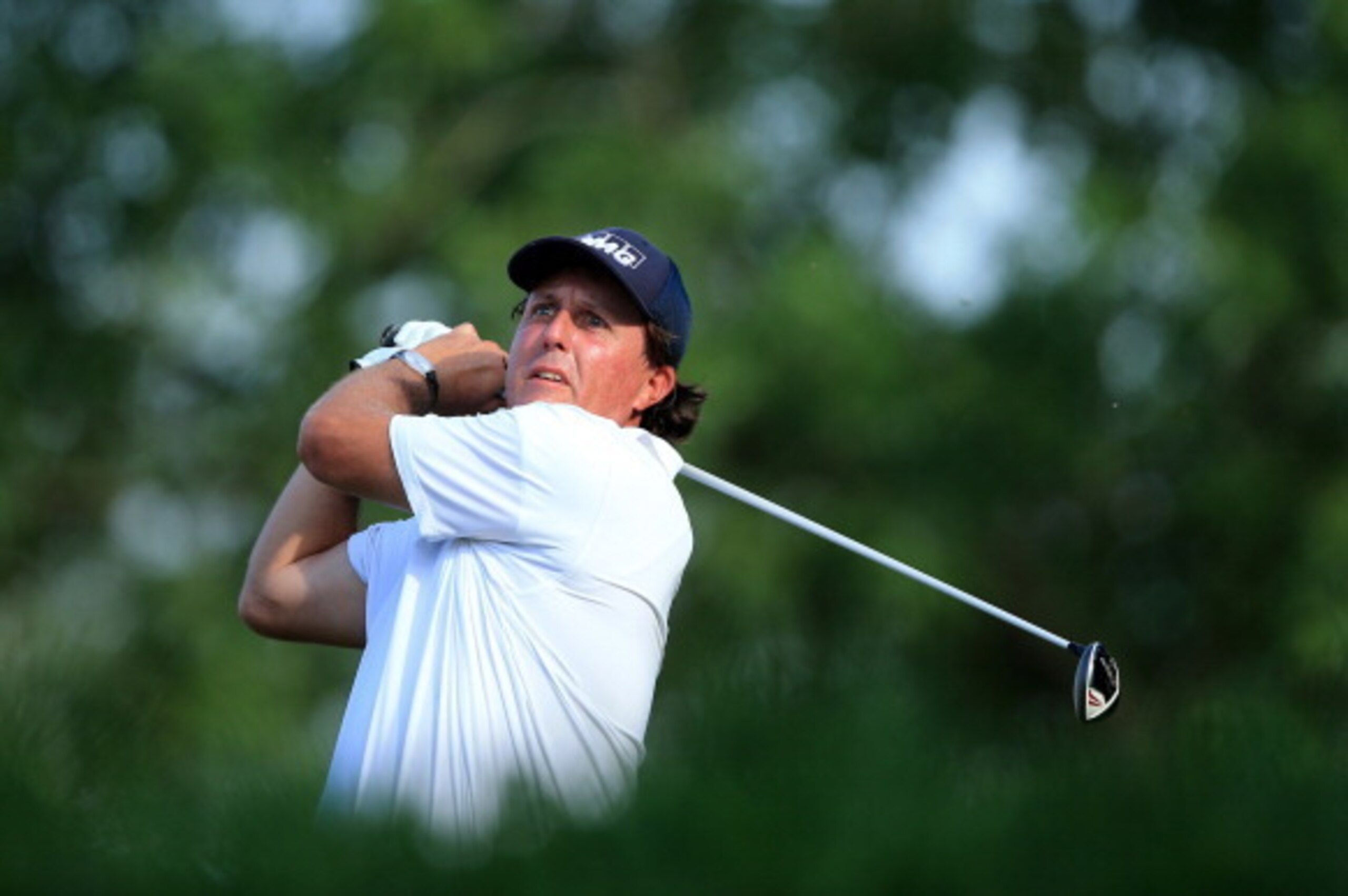 LOUISVILLE, KY - AUGUST 09:  Phil Mickelson of the United States hits his tee shot on the 18th hole during the third round of the 96th PGA Championship at Valhalla Golf Club on August 9, 2014 in Louisville, Kentucky.  (Photo by David Cannon/Getty Images)