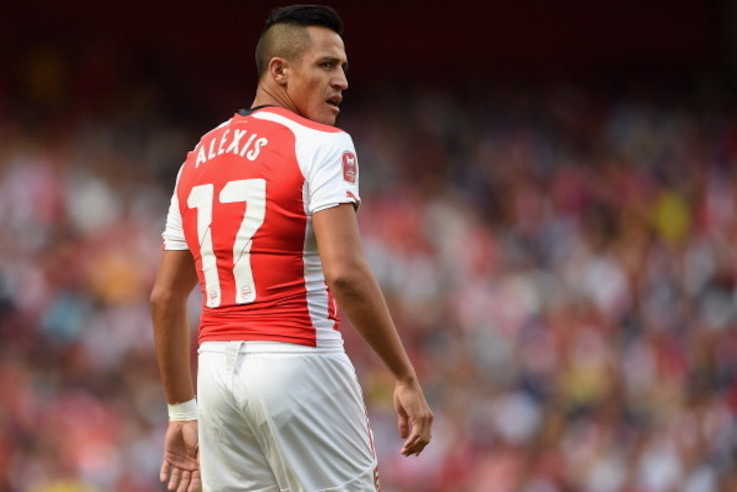 LONDON, ENGLAND - AUGUST 03:  Alexis Sanchez of Arsenal looks on during the Emirates Cup match between Arsenal and AS Monaco at the Emirates Stadium on August 3, 2014 in London, England.  (Photo by Michael Regan/Getty Images)