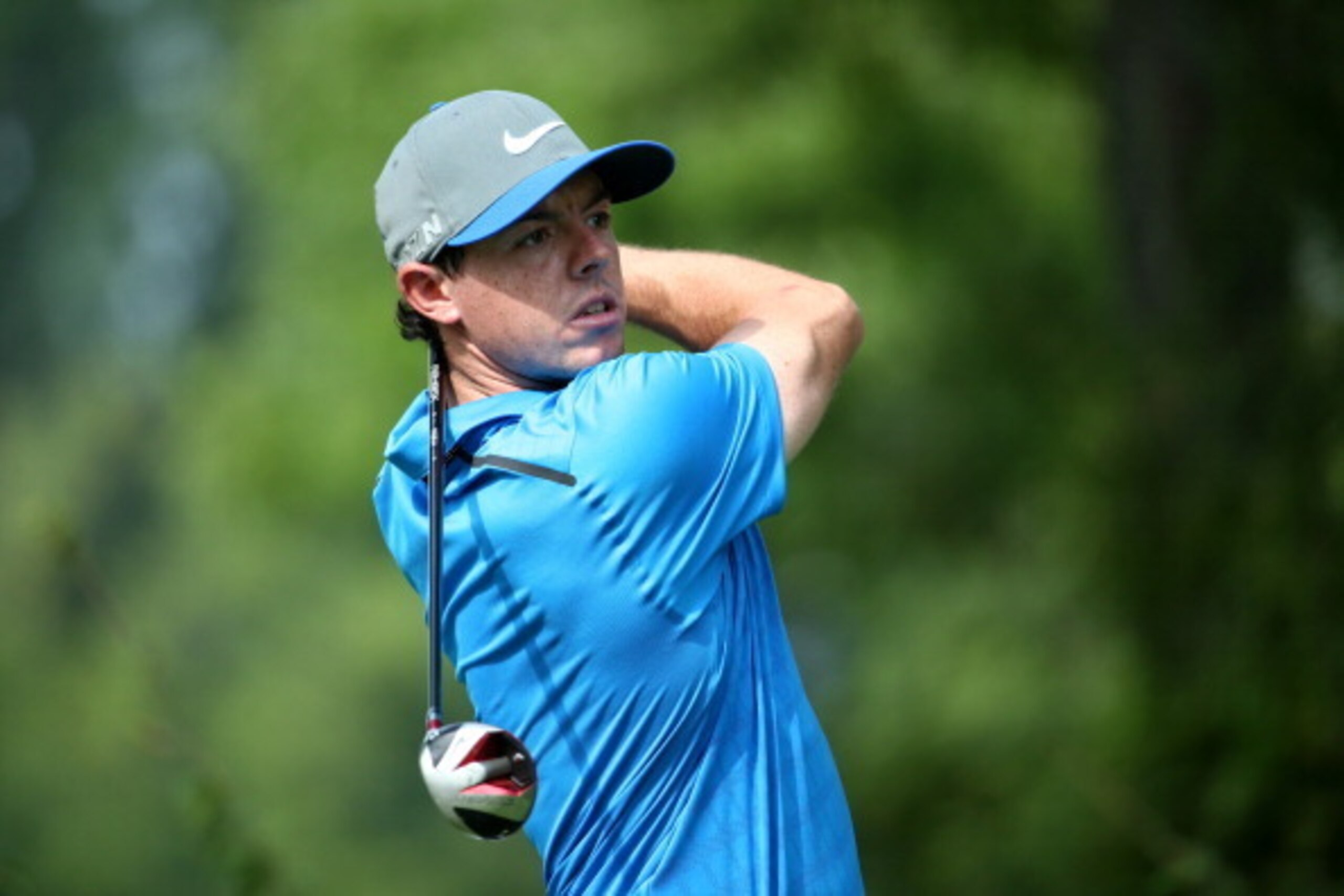 LOUISVILLE, KY - AUGUST 09:  Rory McIlroy of Northern Ireland hits his tee shot on the ninth hole during the third round of the 96th PGA Championship at Valhalla Golf Club on August 9, 2014 in Louisville, Kentucky.  (Photo by Warren Little/Getty Images)