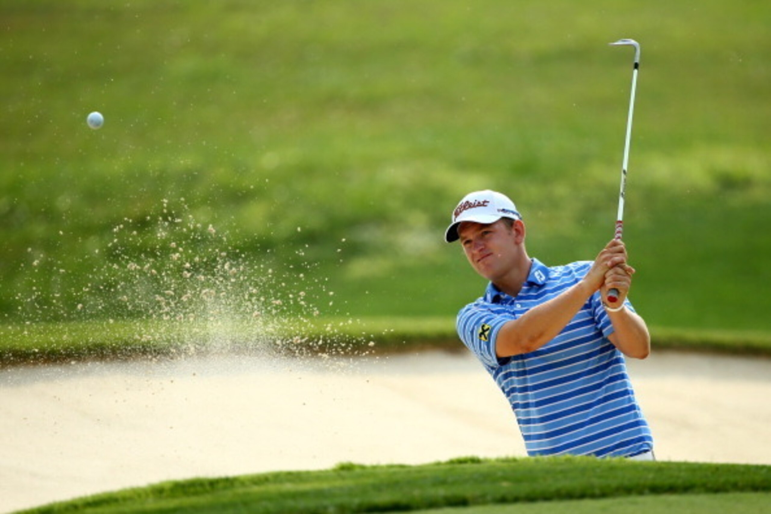 LOUISVILLE, KY - AUGUST 05:  Bernd Wiesberger of Austria hits a shot from a bunker during a practice round prior to the start of the 96th PGA Championship at Valhalla Golf Club on August 5, 2014 in Louisville, Kentucky.  (Photo by Andy Lyons/Getty Images)