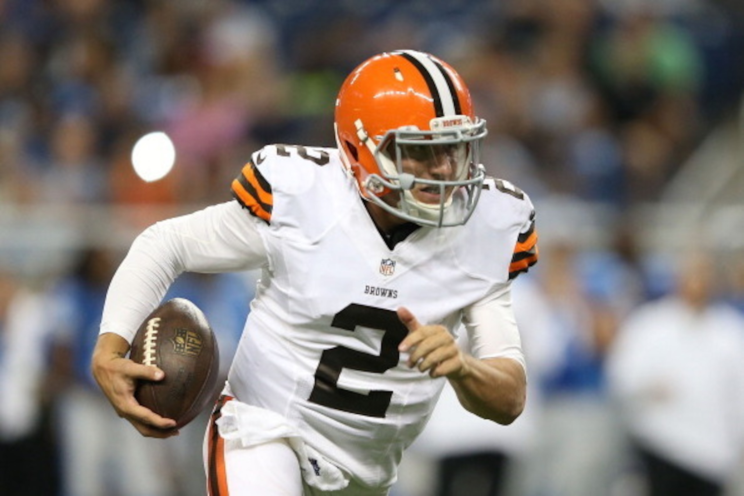 DETROIT, MI - AUGUST 09:  Johnny Manziel #2 of the Cleveland Browns runs for a 16 yard gain during the third quarter the preseason game against the Detroit Lions at Ford Field on August 9, 2014 in Detroit, Michigan. The Lions defeated the Browns 13-12 in 