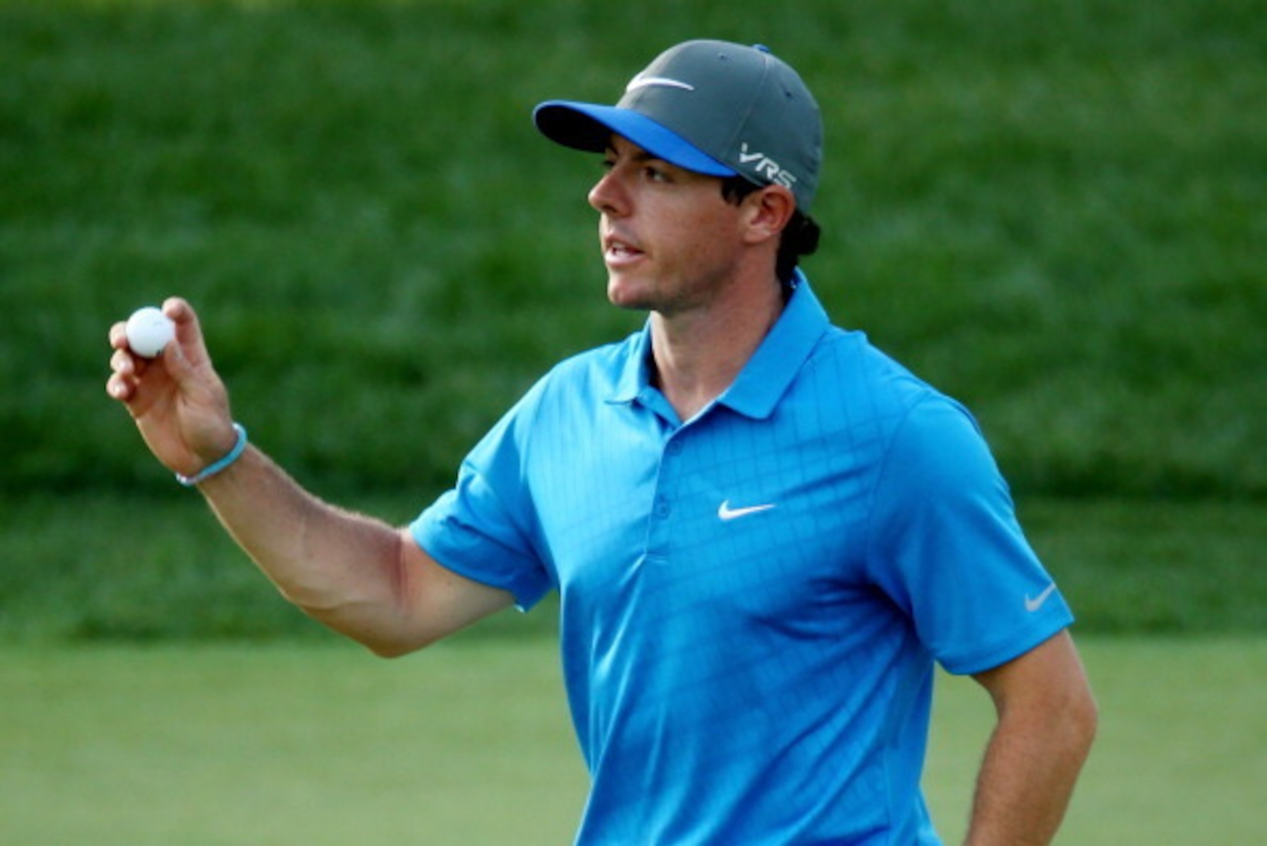 LOUISVILLE, KY - AUGUST 09: Rory McIlroy of Northern Ireland waves on the 16th green during the third round of the 96th PGA Championship at Valhalla Golf Club on August 9, 2014 in Louisville, Kentucky.  (Photo by Warren Little/Getty Images)