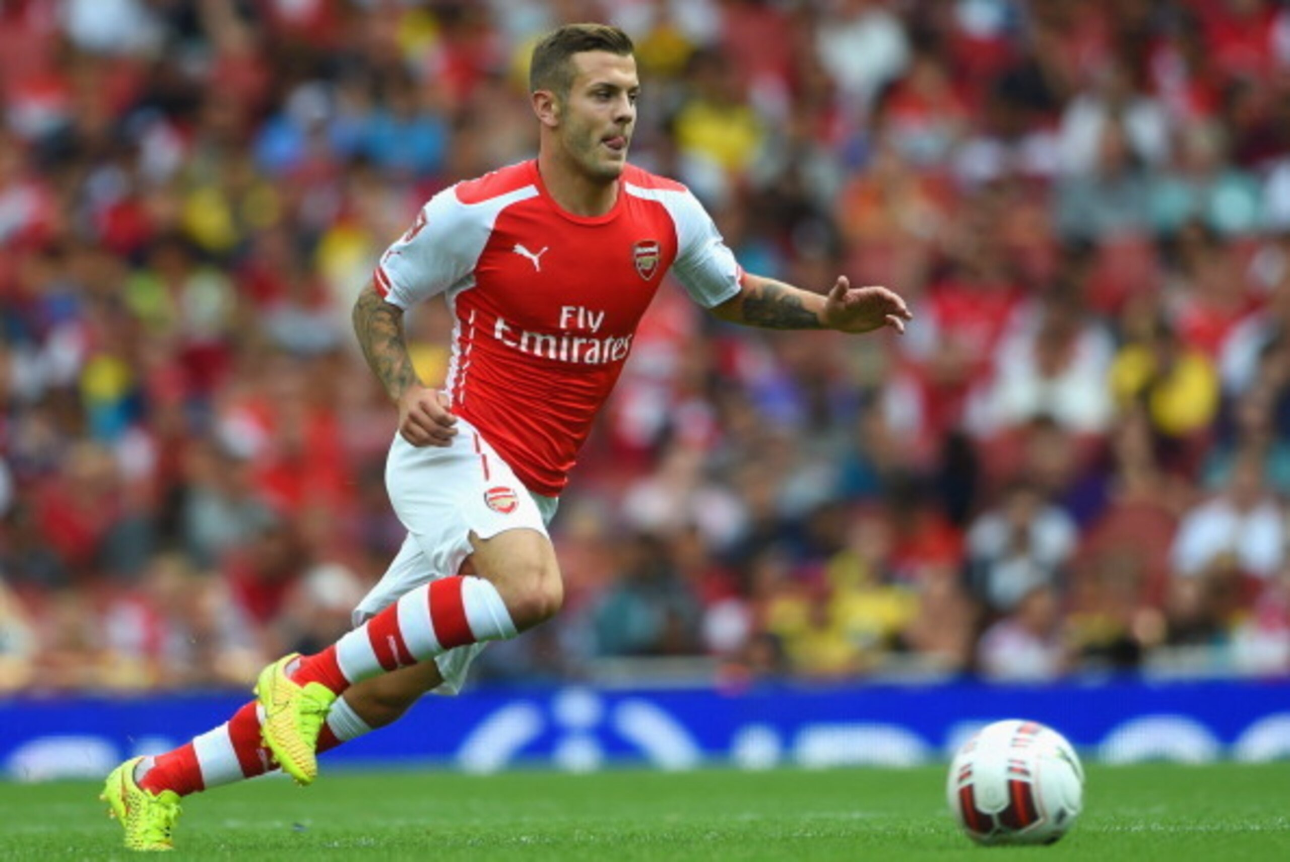 LONDON, ENGLAND - AUGUST 02:  Jack Wilshere of Arsenal in action during the Emirates Cup match between Arsenal and Benfica at the Emirates Stadium on August 2, 2014 in London, England.  (Photo by Michael Regan/Getty Images)