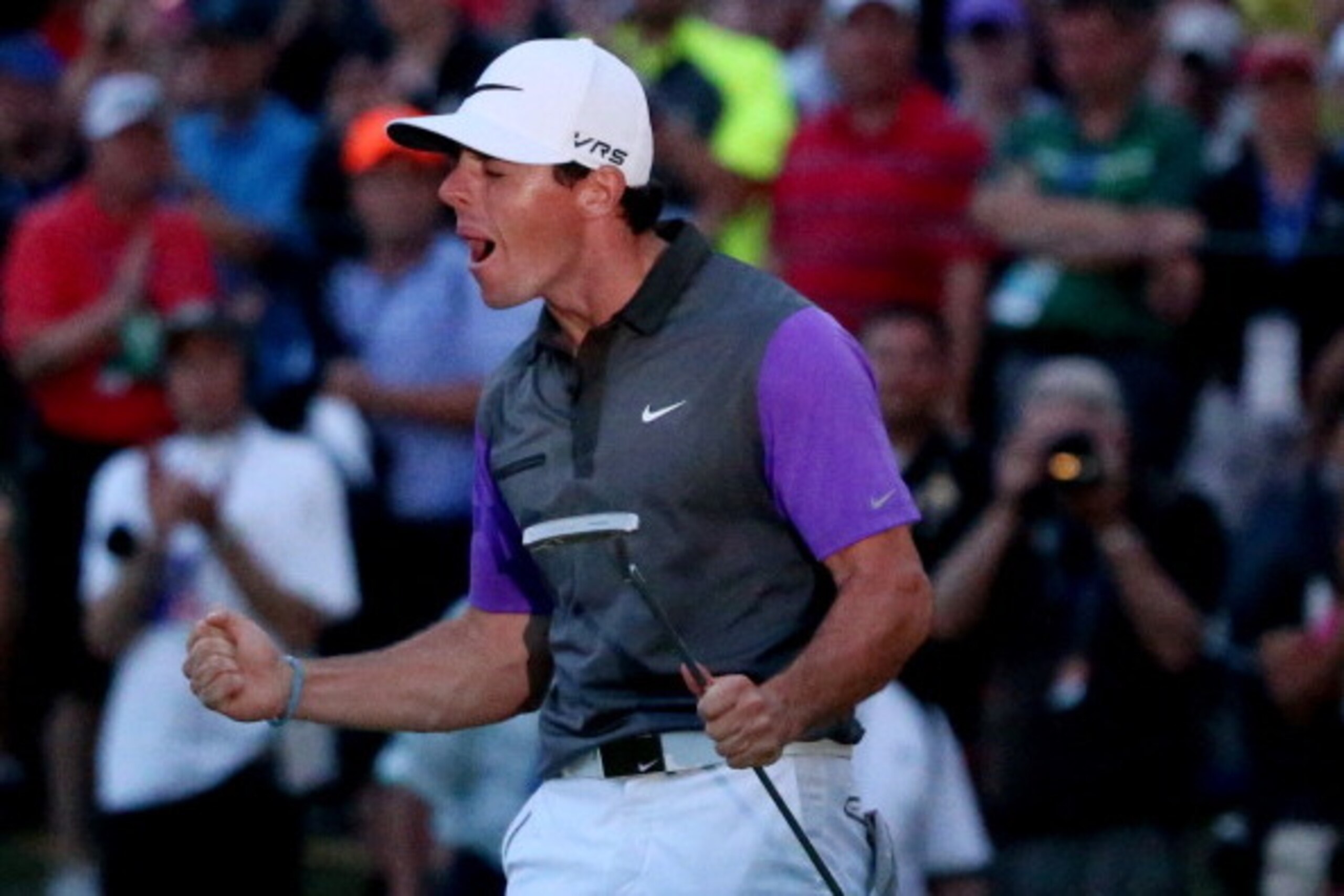 LOUISVILLE, KY - AUGUST 10:  Rory McIlroy of Northern Ireland celebrates his one-stroke victory on the 18th green during the final round of the 96th PGA Championship at Valhalla Golf Club on August 10, 2014 in Louisville, Kentucky.  (Photo by Andrew Redin