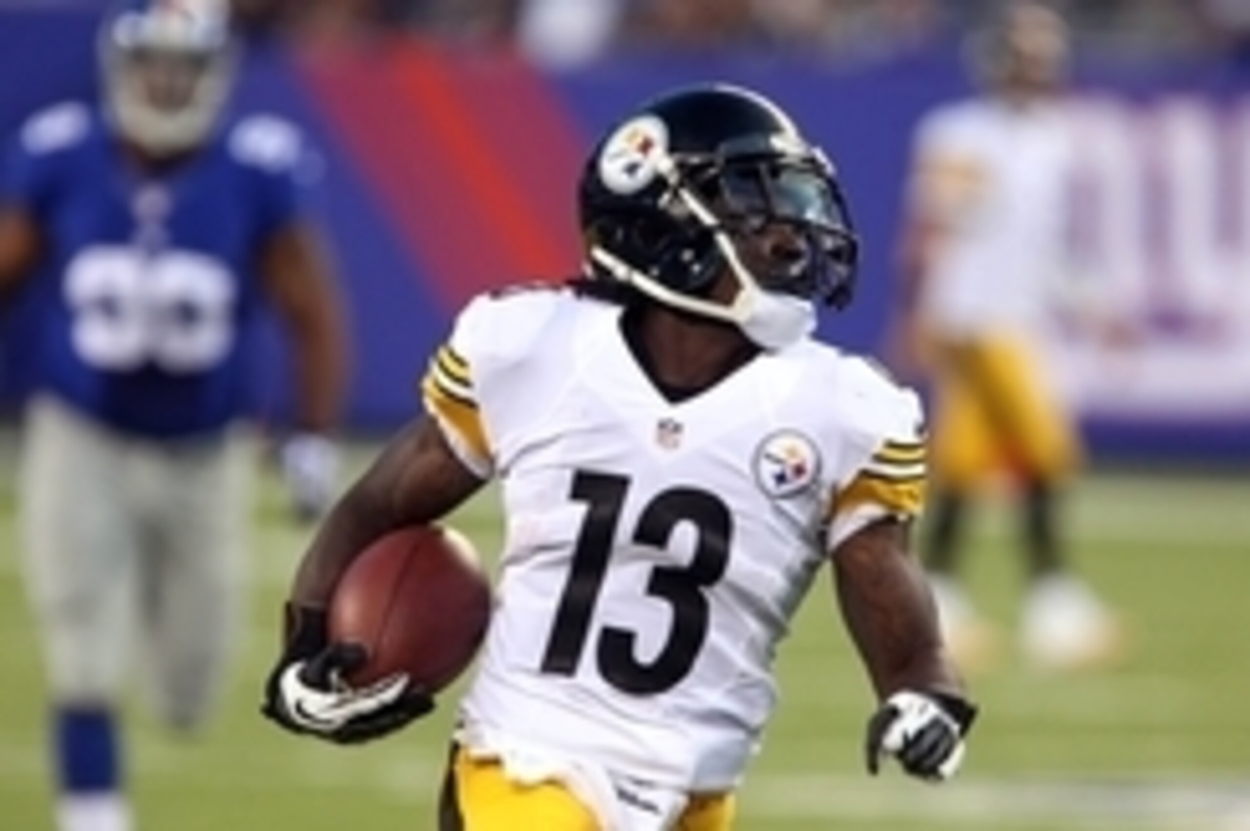 Aug 9, 2014; East Rutherford, NJ, USA;  Pittsburgh Steelers running back Dri Archer (13) rushes for a first down against the New York Giants during first quarter  at MetLife Stadium. Mandatory Credit: Noah K. Murray-USA TODAY Sports