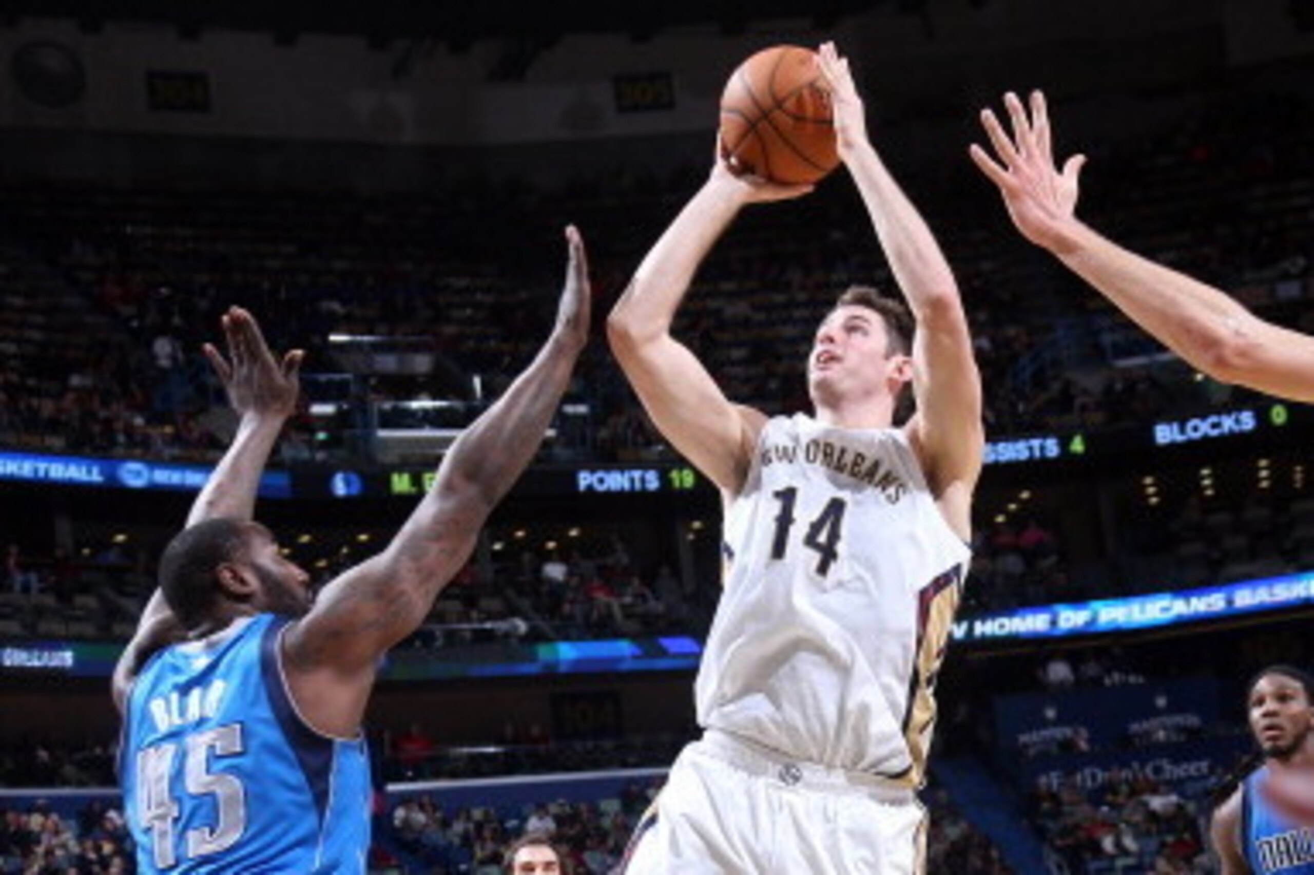 NEW ORLEANS, LA - JANUARY 10: Jason Smith #14 of the New Orleans Pelicans taking a shot during a game agsint the Dallas Mavericks on January 10, 2014 at the New Orleans Arena in New Orleans, Louisiana. NOTE TO USER: User expressly acknowledges and agrees NEW ORLEANS, LA - JANUARY 10: Jason Smith #14 of the New Orleans Pelicans taking a shot during a game agsint the Dallas Mavericks on January 10, 2014 at the New Orleans Arena in New Orleans, Louisiana. NOTE TO USER: User expressly acknowledges and agrees