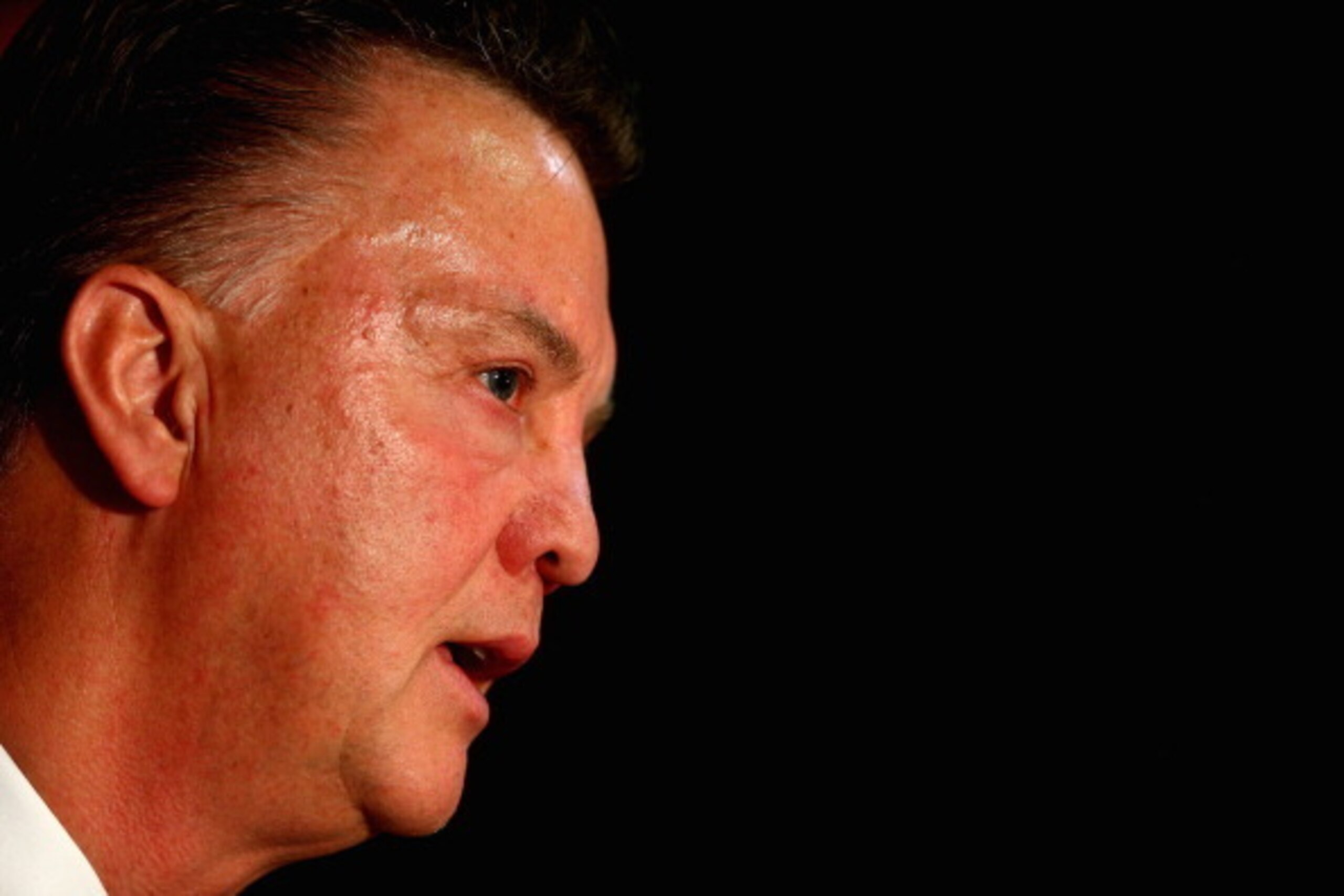 MANCHESTER, ENGLAND - JULY 17:  Louis van Gaal appears at a press conference as he is unveiled as the new Manchester United manager at Old Trafford on July 17, 2014 in Manchester, England.  (Photo by Clive Mason/Getty Images)
