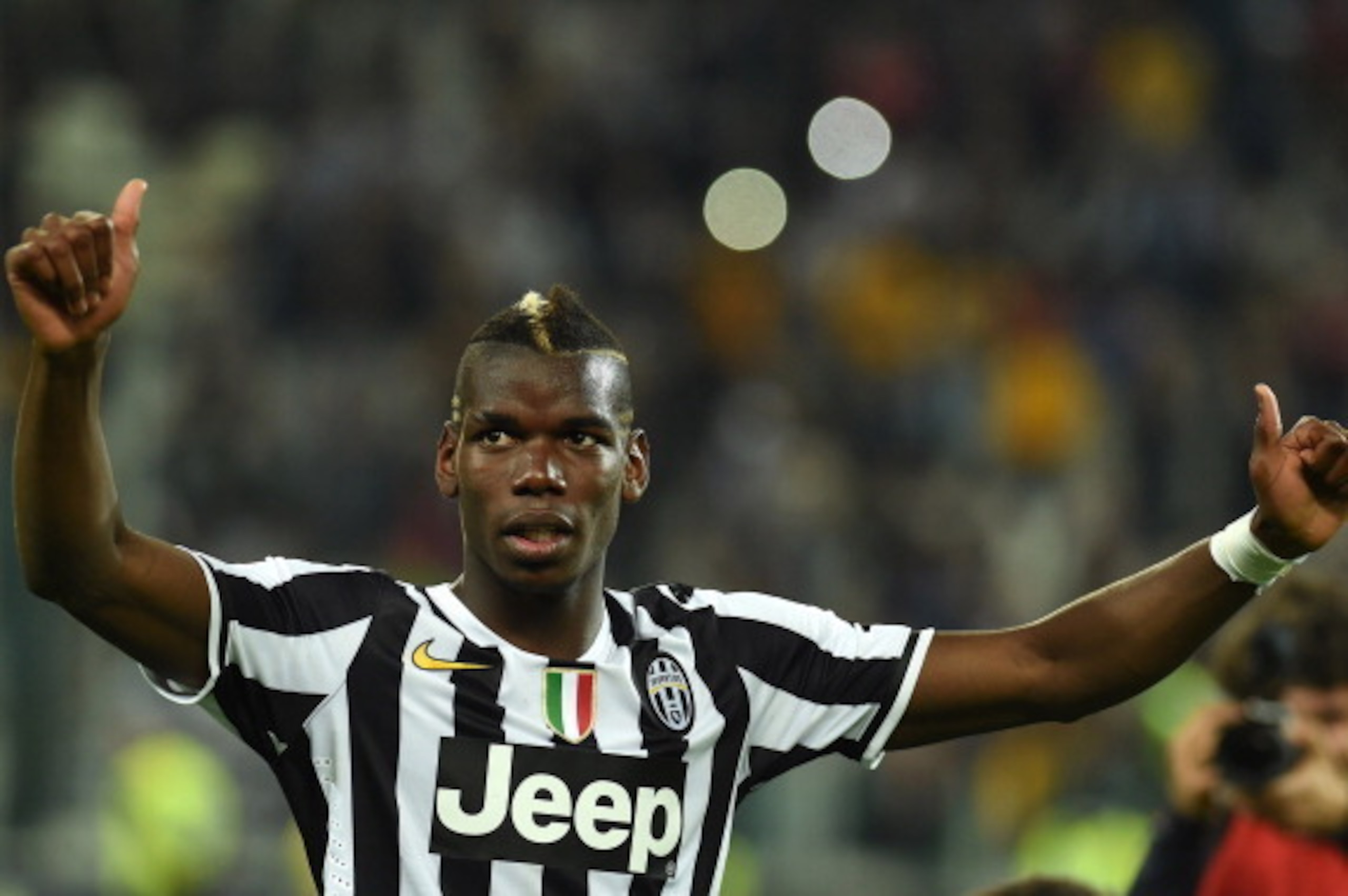 TURIN, ITALY - MAY 05:  Paul Pogba of Juventus celebrates after beating Atalanta BC 1-0 to win the Serie A Championships at the end of the Serie A match between Juventus and Atalanta BC at Juventus Arena on May 5, 2014 in Turin, Italy.  (Photo by Valerio 