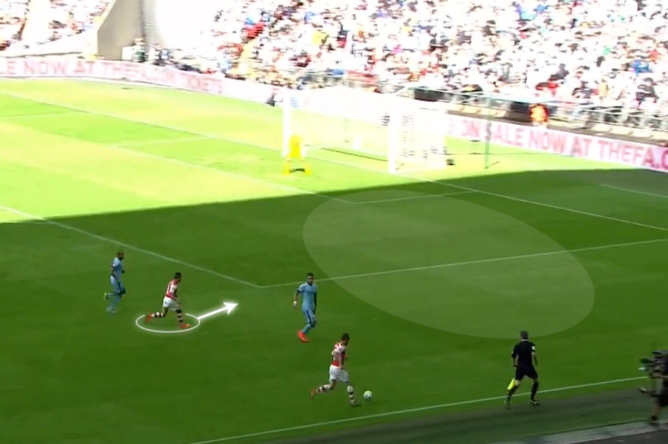 Alexis ghosts in behind Kolarov and crosses from the byline.