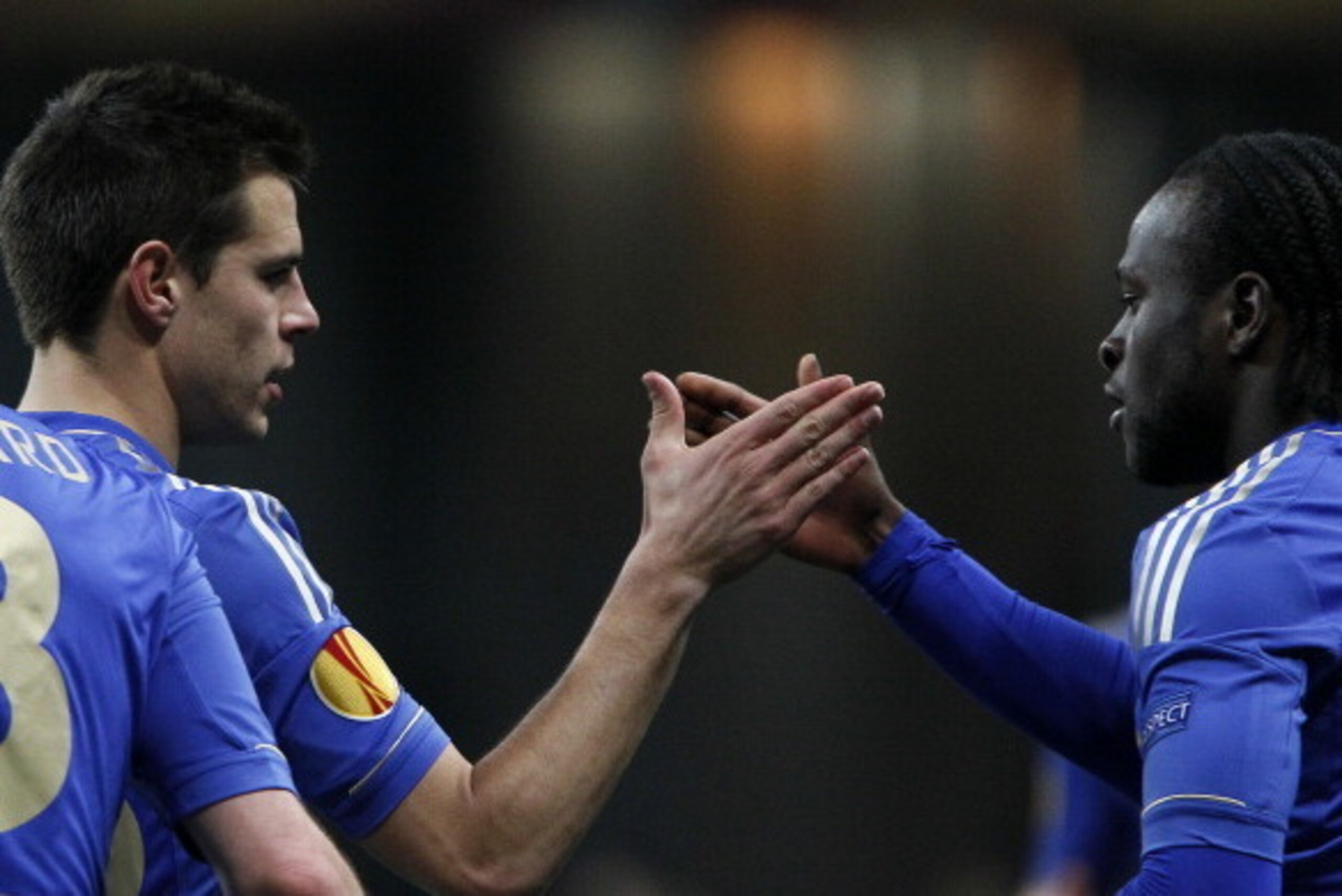 MOSCOW, RUSSIA - APRIL 11: Victor Moses (R) and Cesar Azpilicueta of Chelsea FC celebrate after scoring a goal during the UEFA Europa League quarter final second leg match between FC Rubin Kazan and Chelsea FC at the Luzhniki Stadium on April 11, 2013 in 