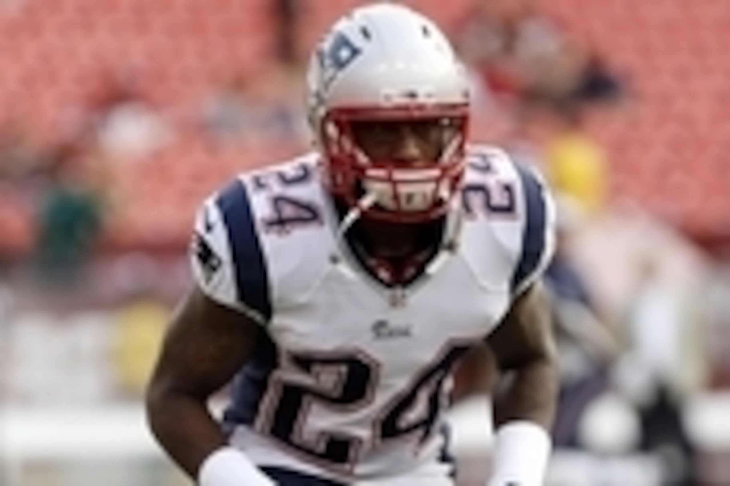 Aug 7, 2014; Landover, MD, USA; New England Patriots cornerback Darrelle Revis (24) warms up prior to the Patriots game against the Washington Redskins at FedEx Field. The Redskins won 23-6. Mandatory Credit: Geoff Burke-USA TODAY Sports