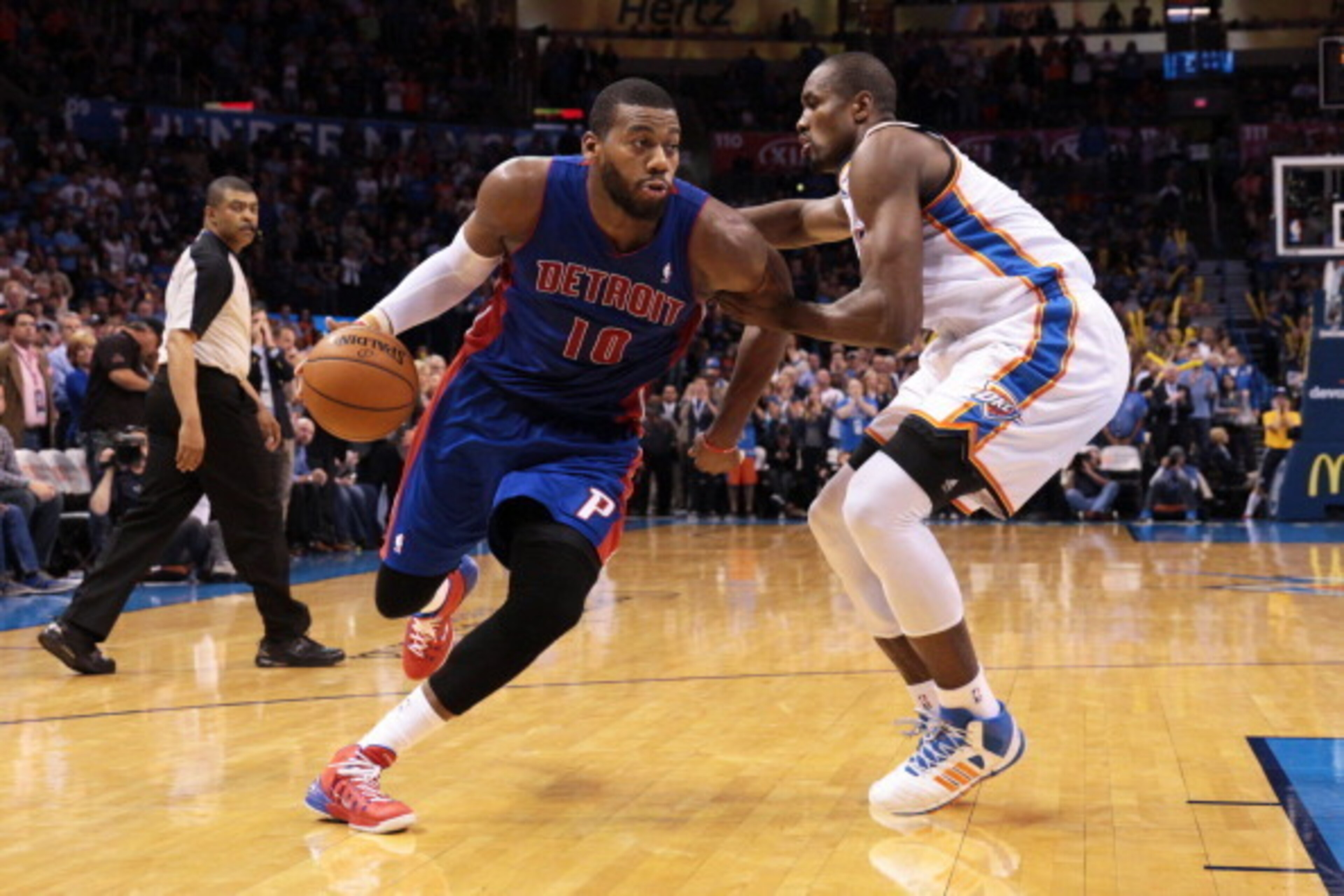 OKLAHOMA CITY, OK - April 16, 2014 :  Greg Monroe #10 of the Detroit Pistons handles the ball against the Oklahoma City Thunder at the Chesapeake Arena on April 16, 2014 in Oklahoma City, Oklahoma. NOTE TO USER:  User expressly acknowledges and agrees tha