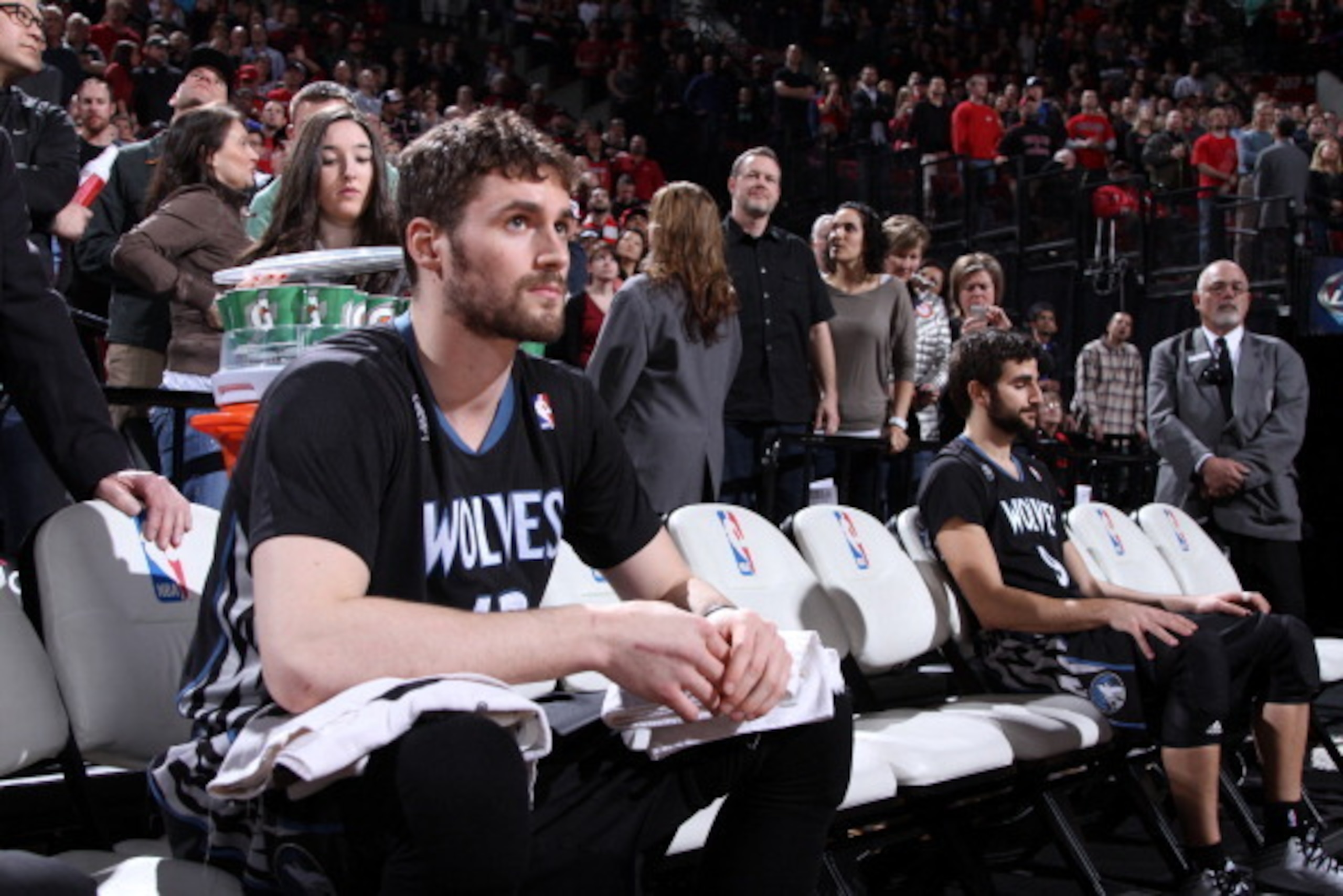 PORTLAND, OR - JANUARY 25:  Kevin Love #42 of the Minnesota Timberwolves sits on the bench before the game against the Portland Trail Blazers on January 25, 2014 at the Moda Center Arena in Portland, Oregon. NOTE TO USER: User expressly acknowledges and a