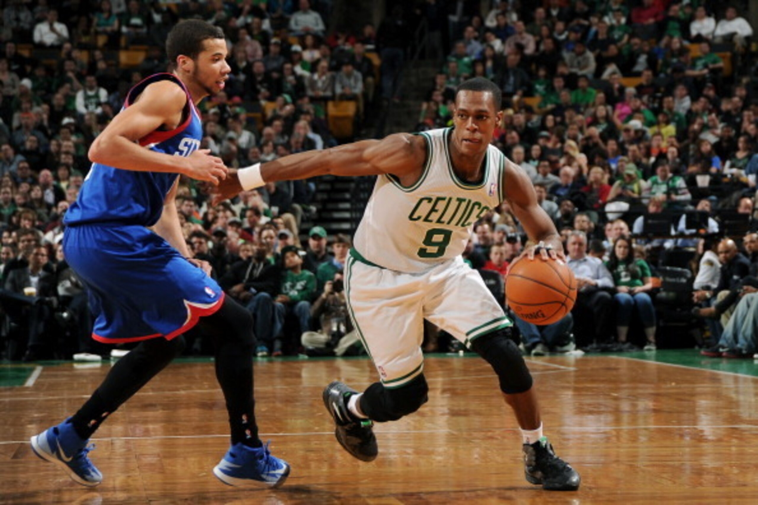 BOSTON, MA - APRIL 4: Rajon Rondo #9 of the Boston Celtics drives against the Philadelphia 76ers on April 4, 2014 at the TD Garden in Boston, Massachusetts.  NOTE TO USER: User expressly acknowledges and agrees that, by downloading and or using this photo