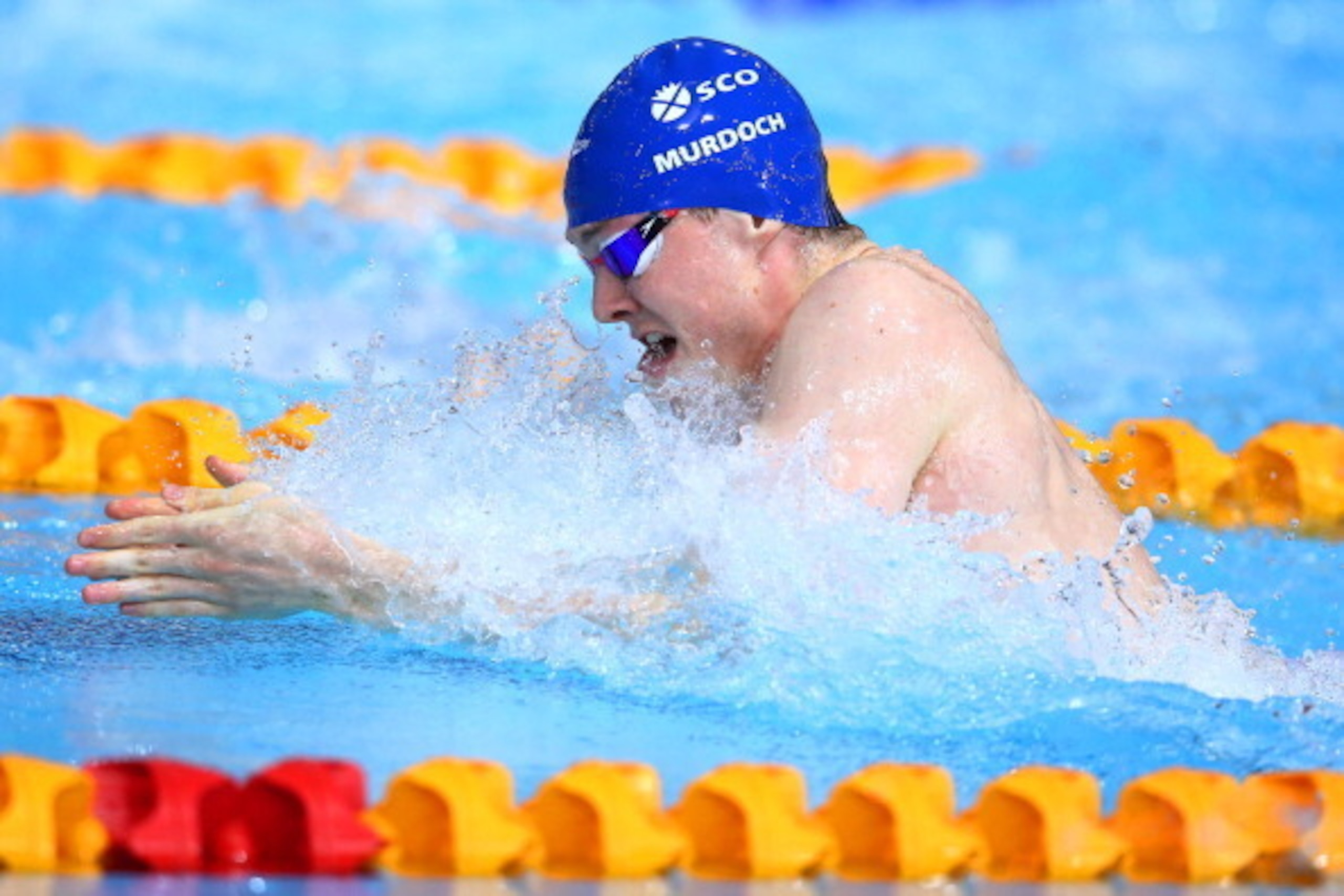 GLASGOW, SCOTLAND - JULY 27: Ross Murdoch of Scotland competes in the Men's 50m Breaststroke Semi-final 2 at Tollcross International Swimming Centre during day four of the Glasgow 2014 Commonwealth Games on July 27, 2014 in Glasgow, Scotland.  (Photo by M