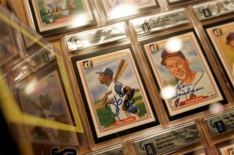 How much will a signed Hank Aaron baseball card be worth in 100 years?