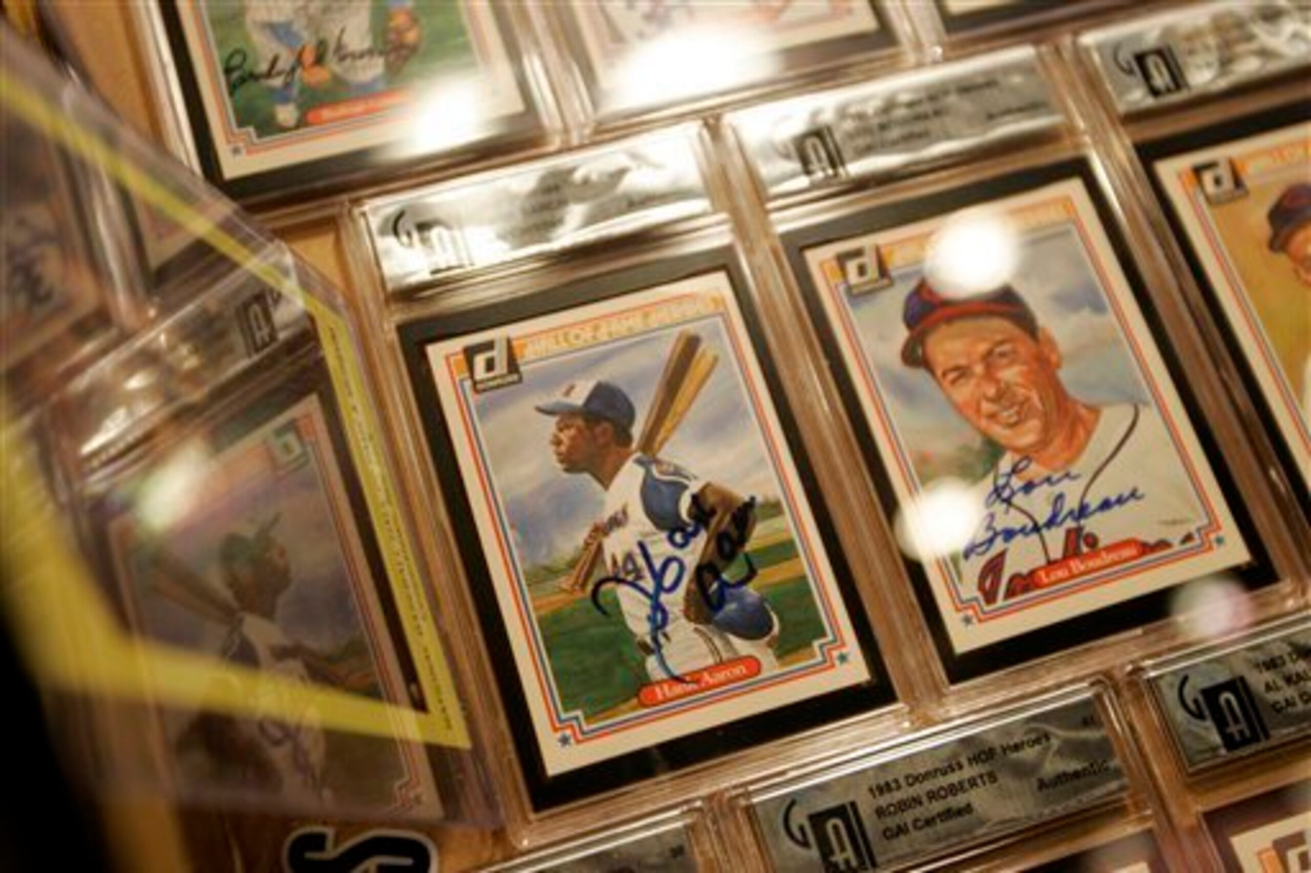 How much will a signed Hank Aaron baseball card be worth in 100 years?
