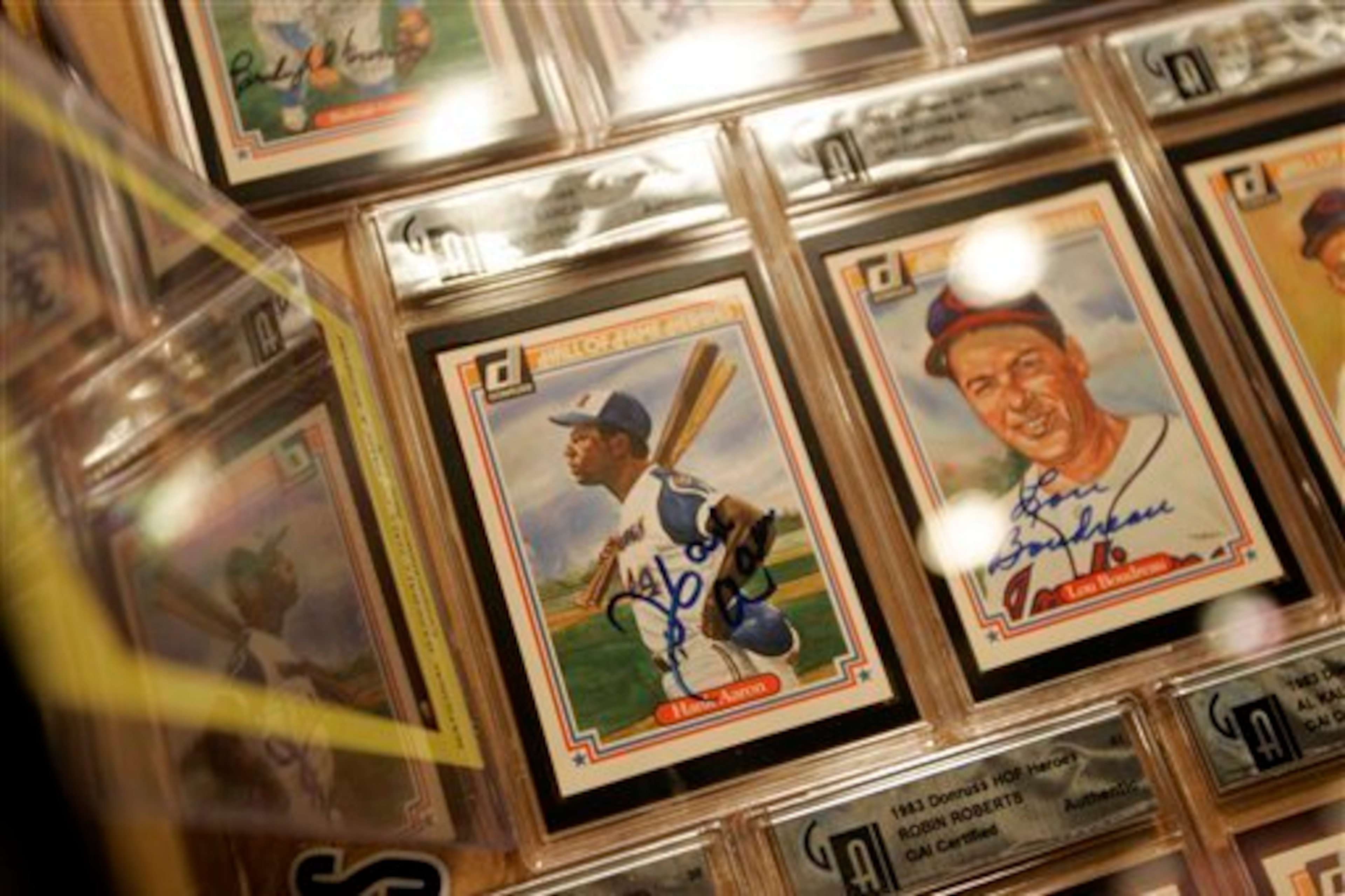 How much will a signed Hank Aaron baseball card be worth in 100 years?