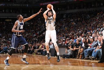 MINNEAPOLIS, MN - DECEMBER 20: Kevin Love #42 of the Minnesota Timberwolves goes up for the three point shot against the Oklahoma City Thunder during the game on December 20, 2012 at Target Center in Minneapolis, Minnesota. NOTE TO USER: User expressly ac