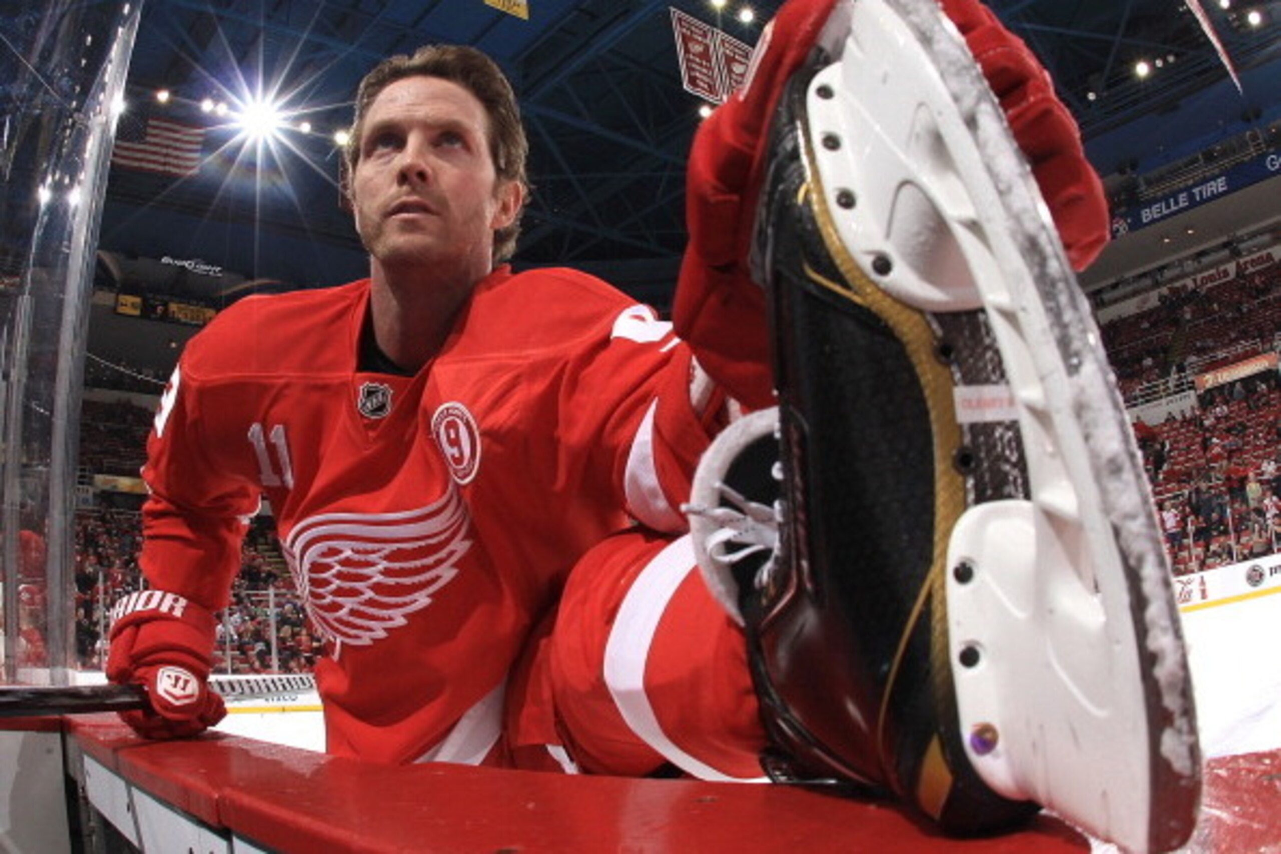 DETROIT, MI - MARCH 31:  Dan Cleary #11 of the Detroit Red Wings wears jersey #9 in honor of Gordie Howe on his 85th birthday during warm ups before a NHL game against the Chicago Blackhawks at Joe Louis Arena on March 31, 2013 in Detroit, Michigan. Chica