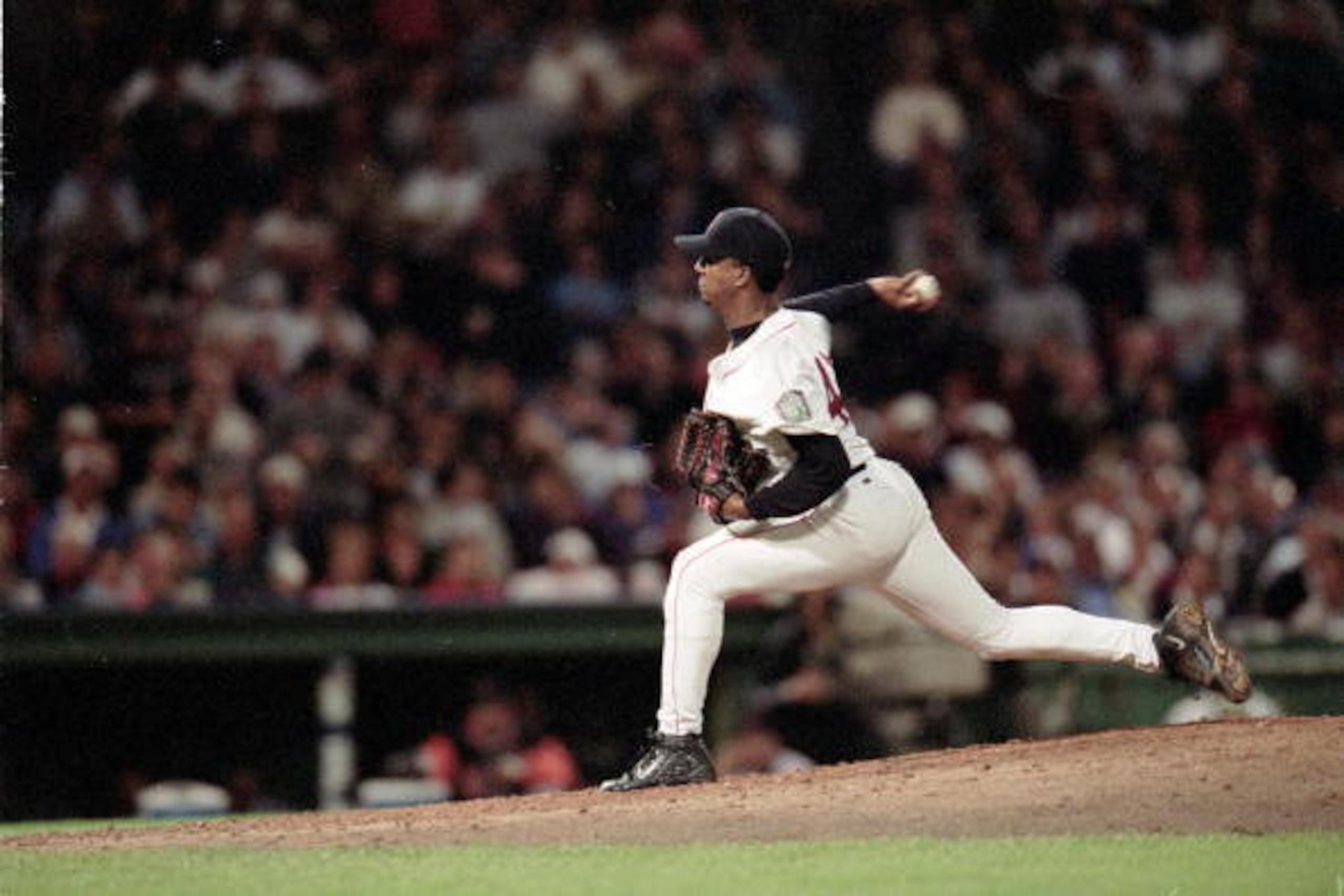 28 Sep 1999: Pedro Martinez #45 of the Boston Red Sox winds back to pitch the ball during a game against the Baltimore Orioles at Fenway Park in Boston, Massachusetts. The Red Sox defeated the Orioles 5-3. Mandatory Credit: Harry How  /Allsport