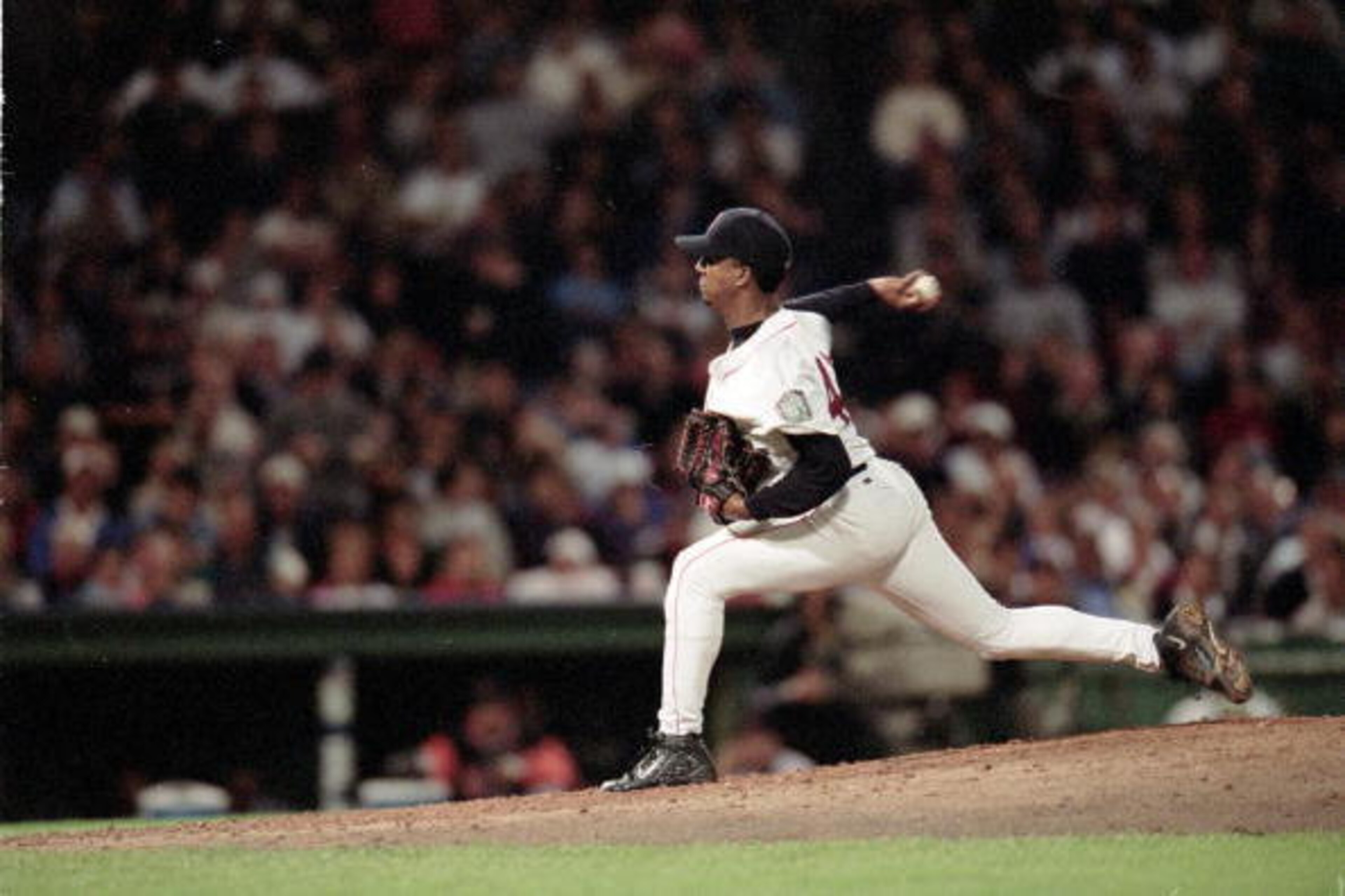 28 Sep 1999: Pedro Martinez #45 of the Boston Red Sox winds back to pitch the ball during a game against the Baltimore Orioles at Fenway Park in Boston, Massachusetts. The Red Sox defeated the Orioles 5-3. Mandatory Credit: Harry How  /Allsport