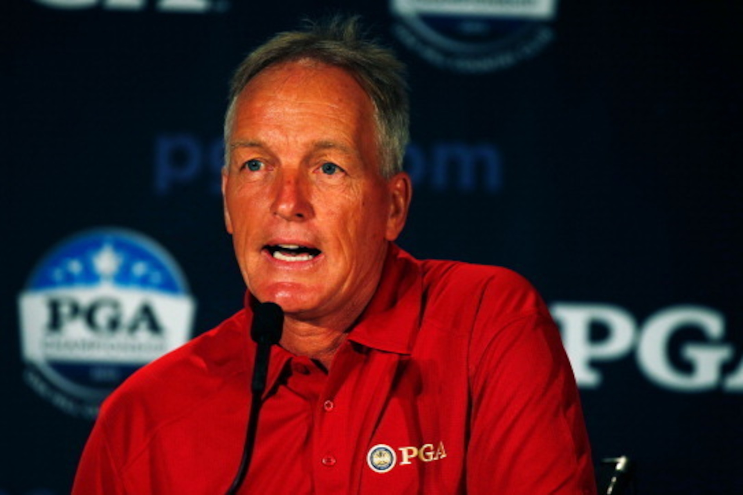 ROCHESTER, NY - AUGUST 07:  Kerry Haigh, Chief Championships Officer of The PGA of America, is interviewed during a press conference prior to the start of the 95th PGA Championship at Oak Hill Country Club on August 7, 2013 in Rochester, New York.  (Photo