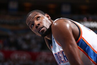 OKLAHOMA CITY, OK - May 31: Kevin Durant #35 of the Oklahoma City Thunder looks on against the San Antonio Spurs in Game 6 of the Western Conference Finals during the 2014 NBA Playoffs at the Chesapeake Arena on May 31, 2014 in Oklahoma City, Oklahoma. NO