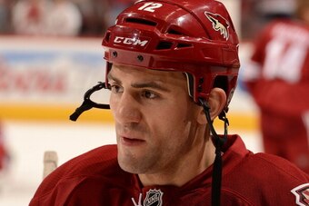 GLENDALE, AZ - MARCH 06:  Paul Bissonnette #12 of the Phoenix Coyotes looks up ice during pregame against the Montreal Canadiens at Jobing.com Arena on March 6, 2014 in Glendale, Arizona.  (Photo by Norm Hall/NHLI via Getty Images)