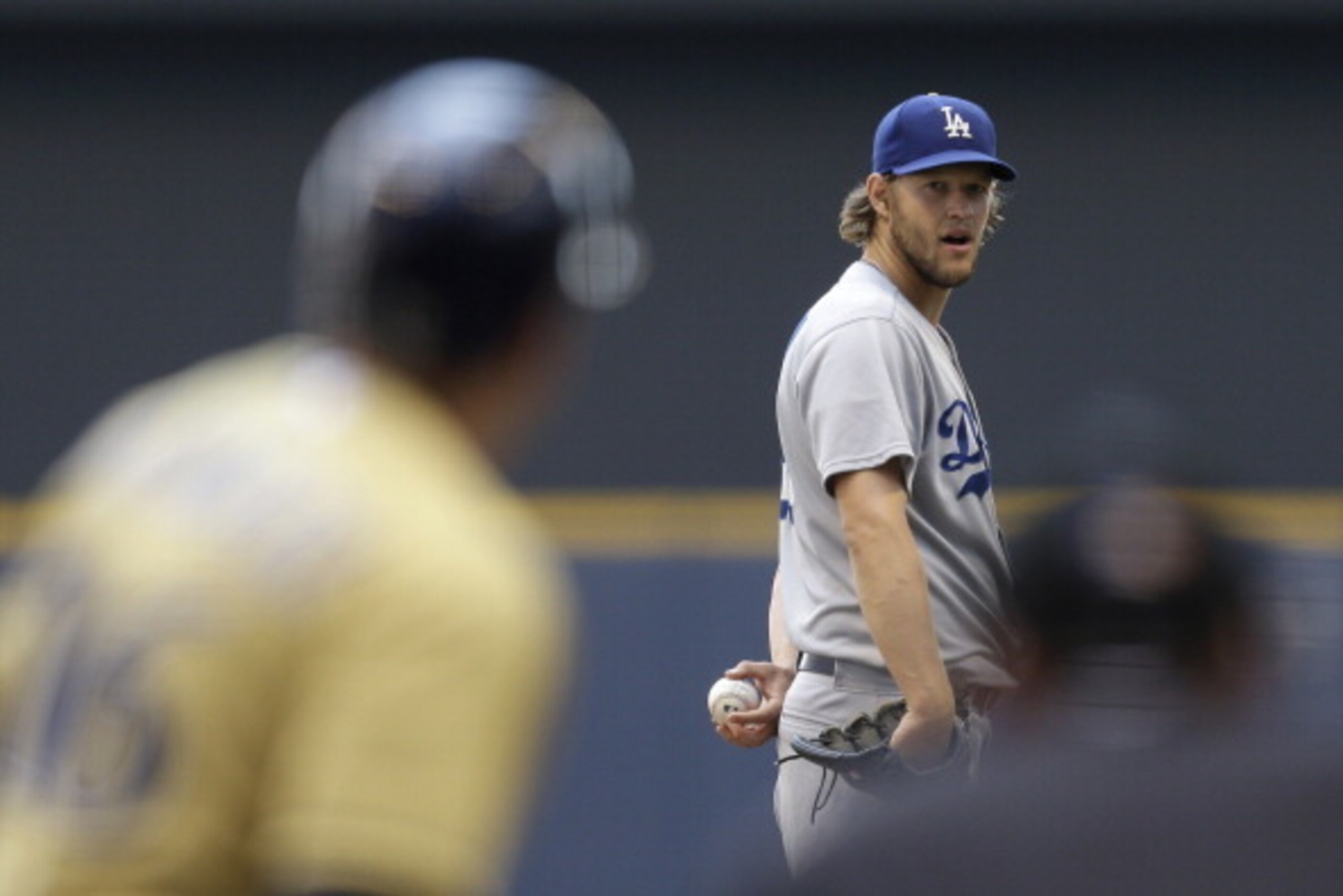 MILWAUKEE, WI - AUGUST 10: Clayton Kershaw #22 of the Los Angeles Dodgers pitches during the first inning against the Milwaukee Brewers at Miller Park on August 10, 2014 in Milwaukee, Wisconsin. (Photo by Mike McGinnis/Getty Images)