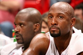 MIAMI - NOVEMBER 27:  Alonzo Mourning #33 and Shaquille O'Neal #32 of the Miami Heat sit on the bench during the game against the Charlotte Bobcats on November 27, 2007 at American Airlines Arena in Miami, Florida.  The Heat won 110-90.  NOTE TO USER: Use