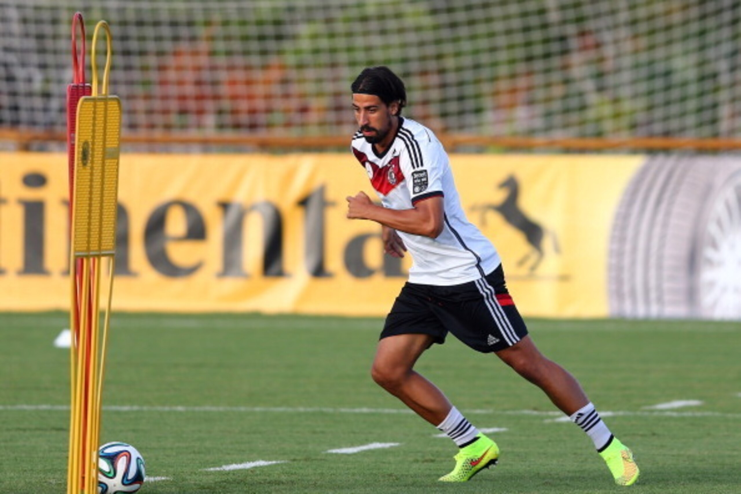 SANTO ANDRE, BRAZIL - JUNE 18: Sami Khedira of Germany runs with the ball during the German national team training at Campo Bahia on June 18, 2014 in Santo Andre, Brazil.  (Photo by Martin Rose/Getty Images)