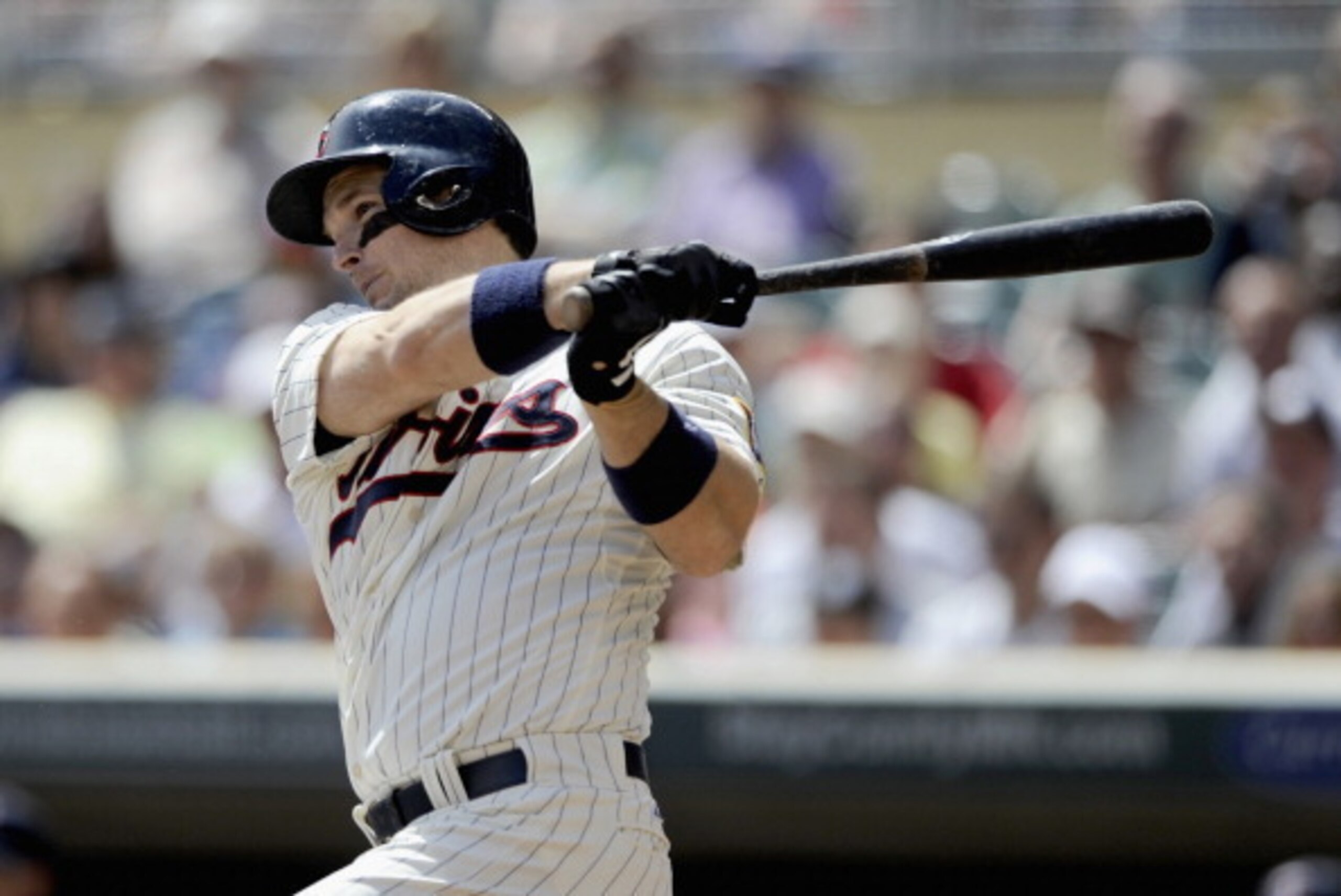 MINNEAPOLIS, MN - MAY 15: Josh Willingham #16 of the Minnesota Twins hits an RBI single against the Chicago White Sox during the first inning of the game on May 15, 2013 at Target Field in Minneapolis, Minnesota. (Photo by Hannah Foslien/Getty Images)