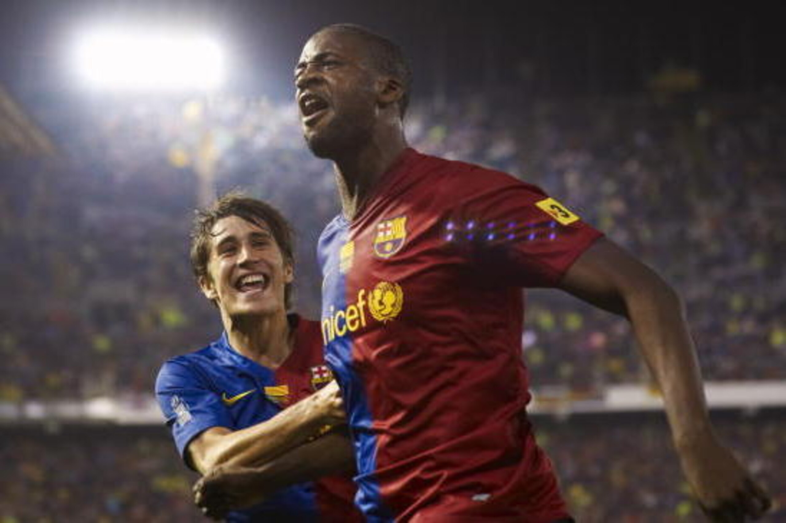 VALENCIA, SPAIN - MAY 13:  Toure Yaya of Barcelona celebrates the first goal with teammate Bojan Krkic during the Copa del Rey final match between Barcelona and Athletic Bilbao at the Mestalla stadium on May 13, 2009 in Valencia, Spain. Barcelona won 4-1.