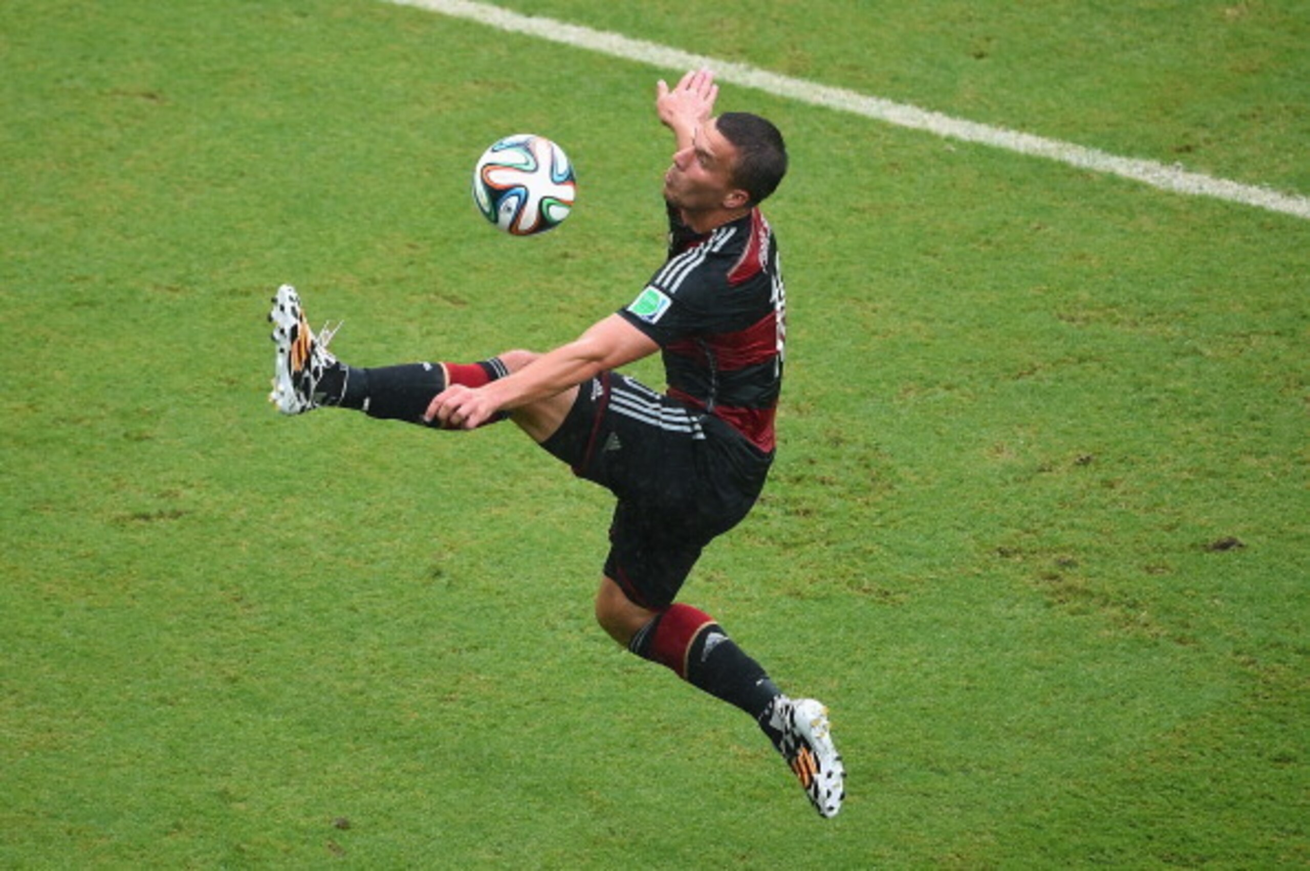 RECIFE, BRAZIL - JUNE 26:  Lukas Podolski of Germany controls the ball during the 2014 FIFA World Cup Brazil group G match between the United States and Germany at Arena Pernambuco on June 26, 2014 in Recife, Brazil.  (Photo by Laurence Griffiths/Getty Im