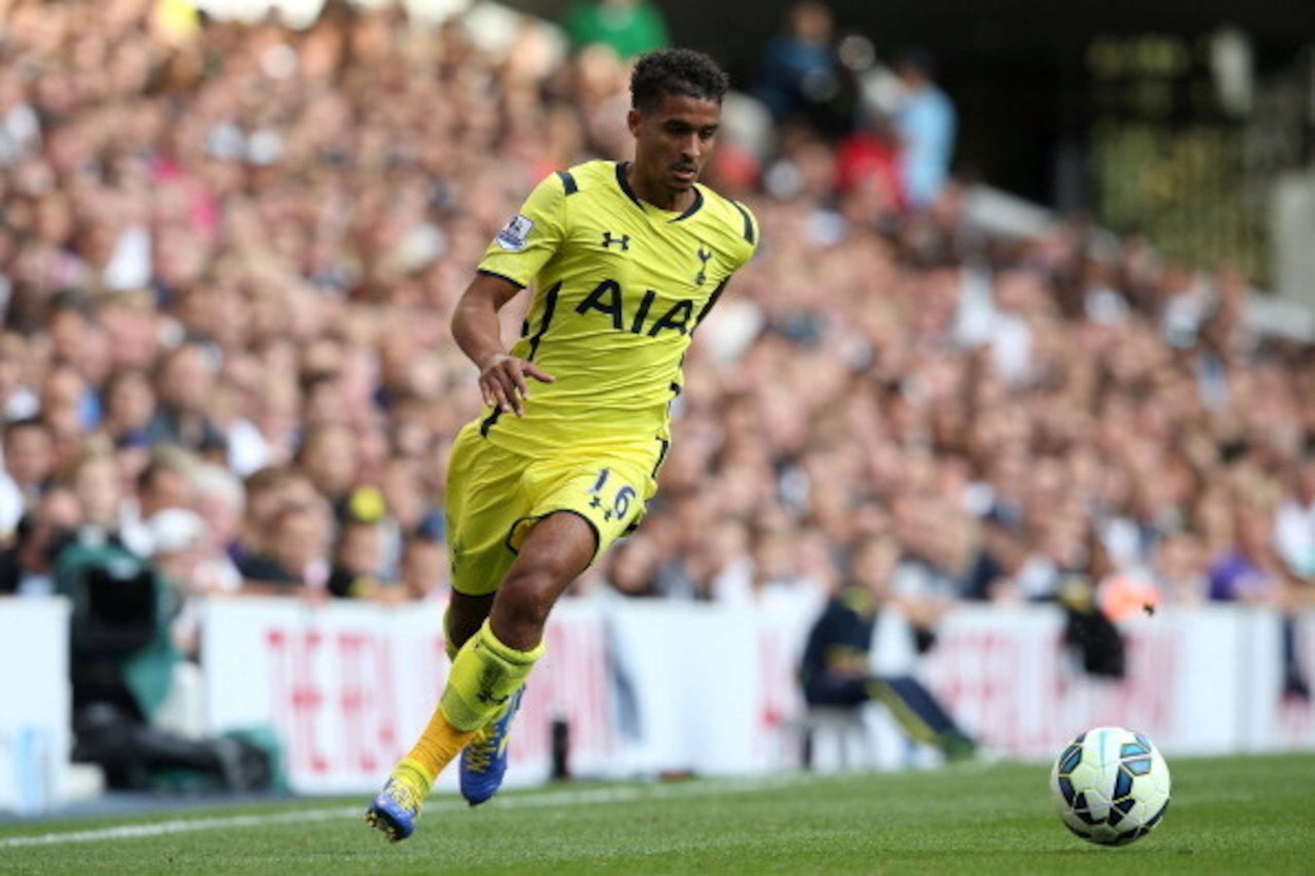 LONDON, ENGLAND - AUGUST 09:  Kyle Naughton of Spurs controls the ball during a pre season friendly match between Tottenham Hotspur and FC Schalke at White Hart Lane on August 9, 2014 in London, England.  (Photo by Jan Kruger/Getty Images)