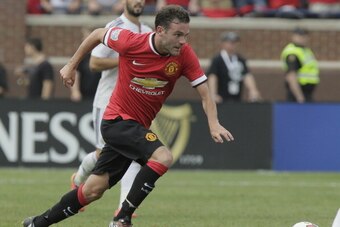 ANN ARBOR, MI - AUGUST 2: Juan Mata #8 of Manchester United drives the ball against Real Madrid during the second half of the Guinness International Champions Cup at Michigan Stadium on August 2, 2014, in Ann Arbor, Mich (Photo by Duane Burleson/Getty Ima