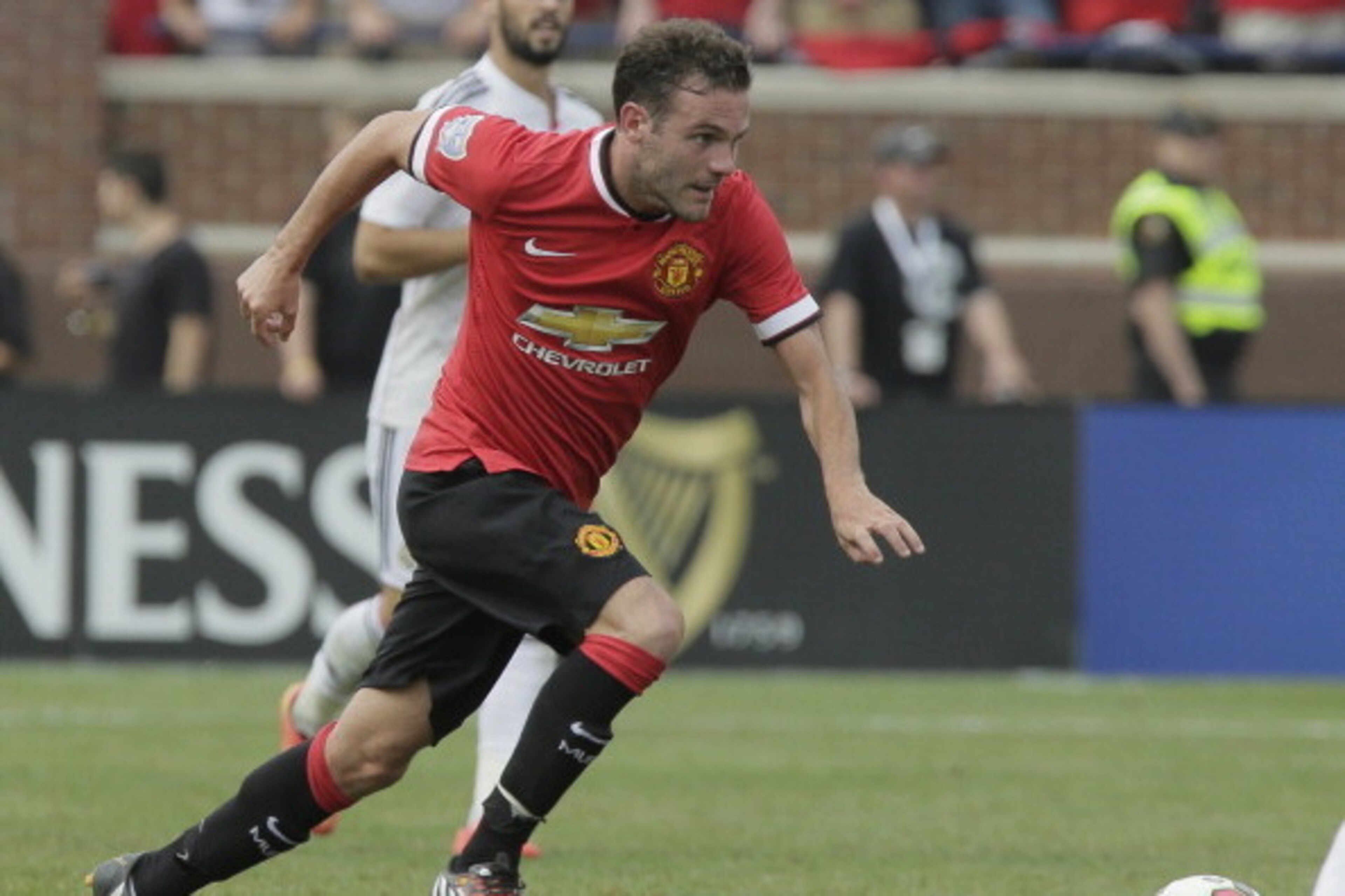 ANN ARBOR, MI - AUGUST 2: Juan Mata #8 of Manchester United drives the ball against Real Madrid during the second half of the Guinness International Champions Cup at Michigan Stadium on August 2, 2014, in Ann Arbor, Mich (Photo by Duane Burleson/Getty Ima ANN ARBOR, MI - AUGUST 2: Juan Mata #8 of Manchester United drives the ball against Real Madrid during the second half of the Guinness International Champions Cup at Michigan Stadium on August 2, 2014, in Ann Arbor, Mich (Photo by Duane Burleson/Getty Ima