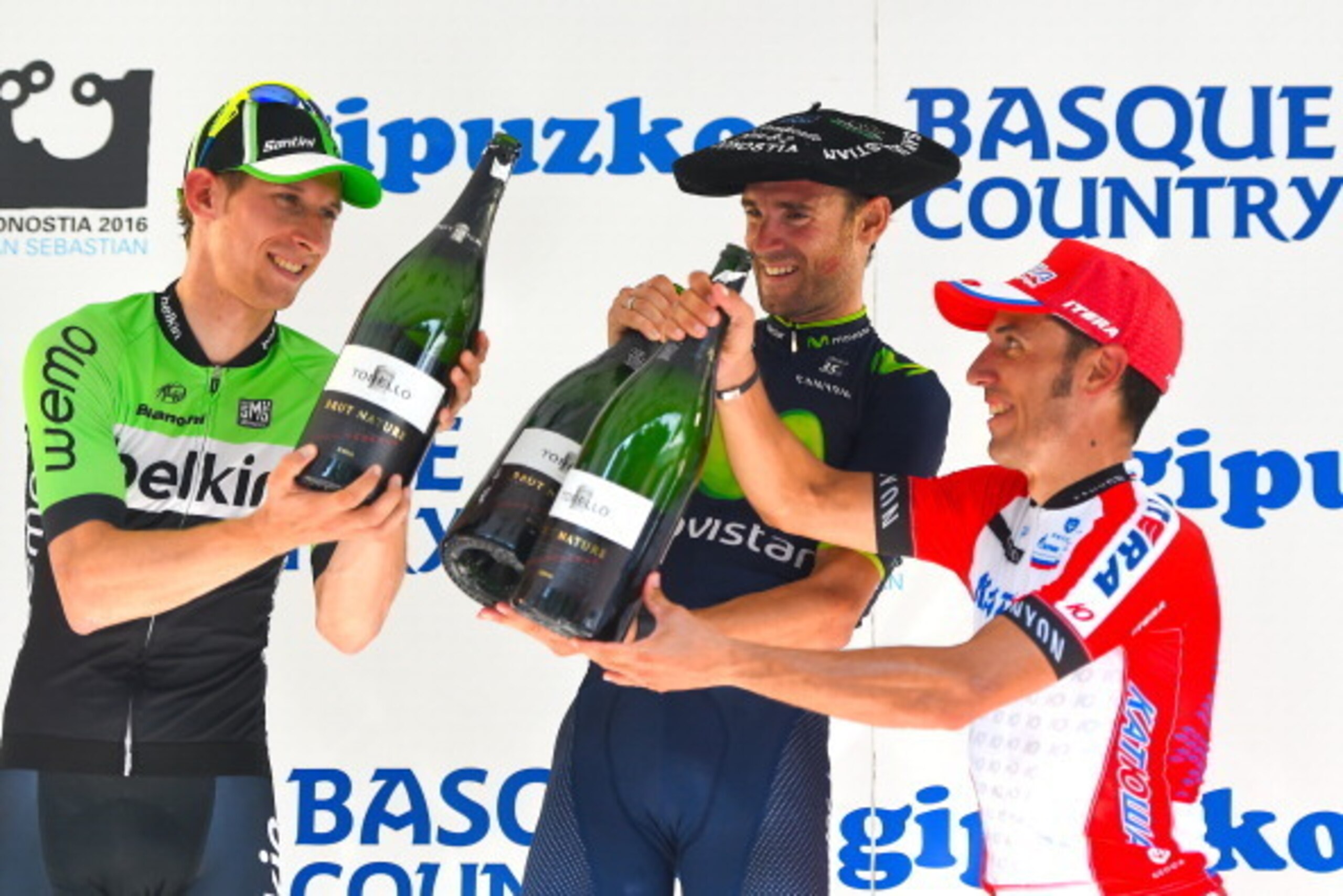SAN SEBASTIAN, SPAIN - AUGUST 02: (L-R) Bauke Mollema of The Netherlands and the Belkin Pro Cycling Team, second, Alejandro Valverde of Spain and Team Movistar, first, and Joaquin Rodriguez of Spain and Team Katusha, third, celebrate during the podium c SAN SEBASTIAN, SPAIN - AUGUST 02: (L-R) Bauke Mollema of The Netherlands and the Belkin Pro Cycling Team, second, Alejandro Valverde of Spain and Team Movistar, first, and Joaquin Rodriguez of Spain and Team Katusha, third, celebrate during the podium c