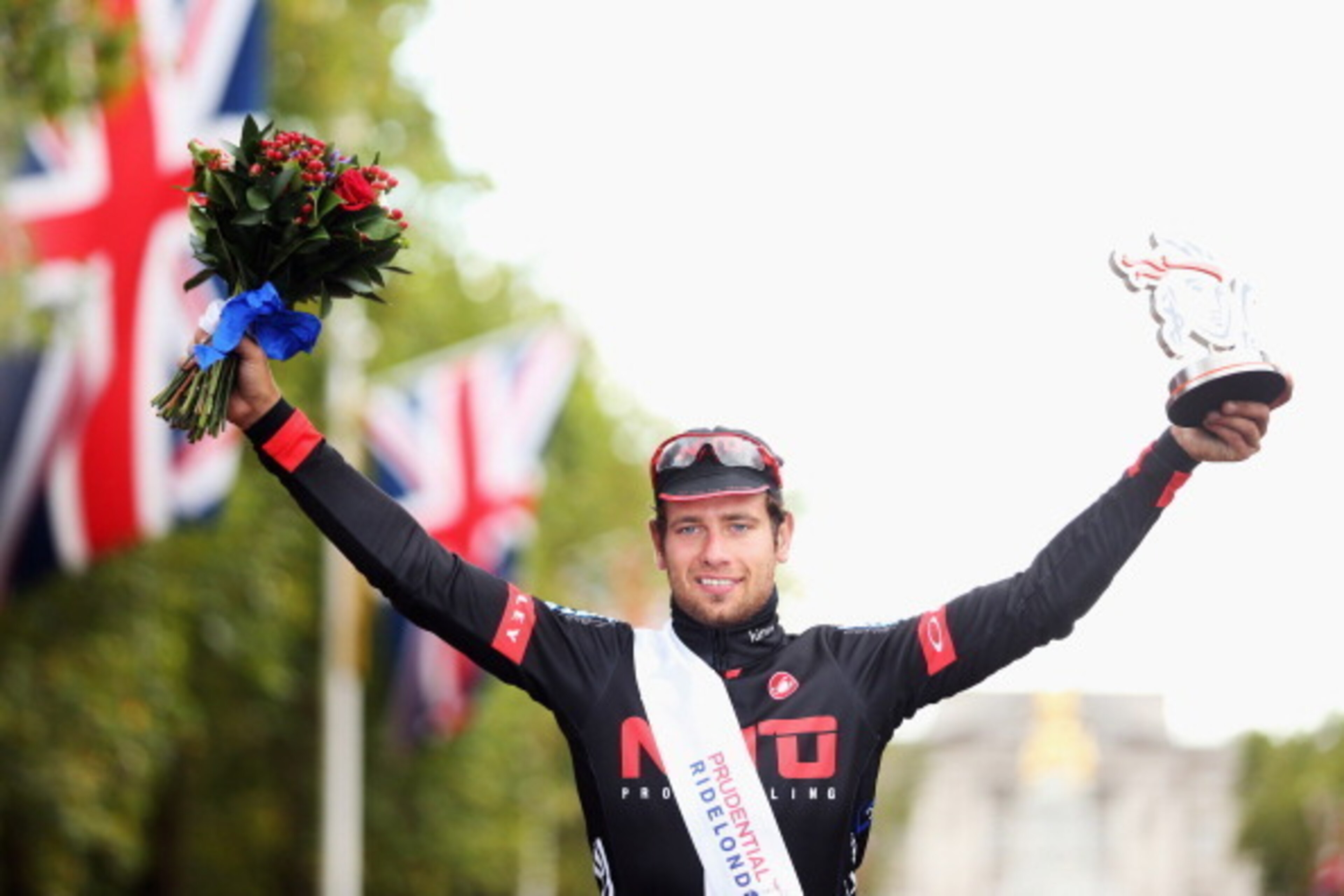 LONDON, ENGLAND - AUGUST 10:  Adam Blythe of Great Britain and NFTO celebrates winning the Prudential RideLondon-Surrey Classic from the Queen Elizabeth Olympic Park to The Mall on August 10, 2014 in London, England.  (Photo by Bryn Lennon/Getty Images)