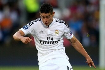 CARDIFF, WALES - AUGUST 12:  James Rodriguez of Real Madrid crosses the ball during the UEFA Super Cup between Real Madrid and Sevilla FC at Cardiff City Stadium on August 12, 2014 in Cardiff, Wales.  (Photo by Clive Mason/Getty Images)