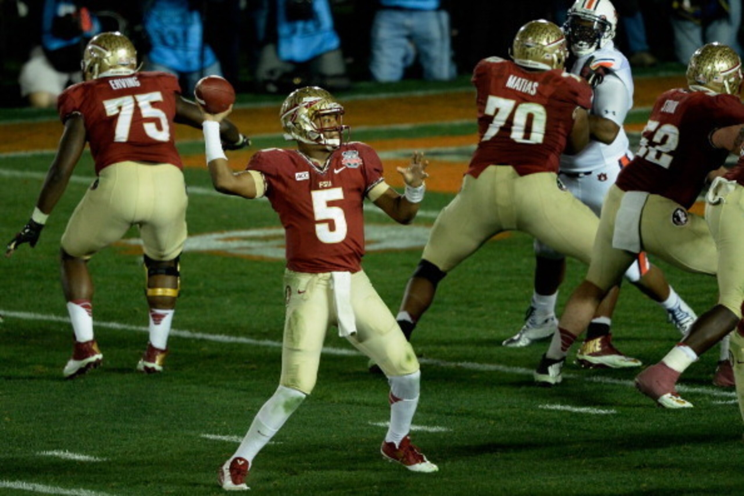 PASADENA, CA - JANUARY 06: Quarterback Jameis Winston #5 of the Florida State Seminoles drops back to pass against the Auburn Tigers during the 2014 Vizio BCS National Championship Game at the Rose Bowl on January 6, 2014 in Pasadena, California. (Photo PASADENA, CA - JANUARY 06: Quarterback Jameis Winston #5 of the Florida State Seminoles drops back to pass against the Auburn Tigers during the 2014 Vizio BCS National Championship Game at the Rose Bowl on January 6, 2014 in Pasadena, California. (Photo