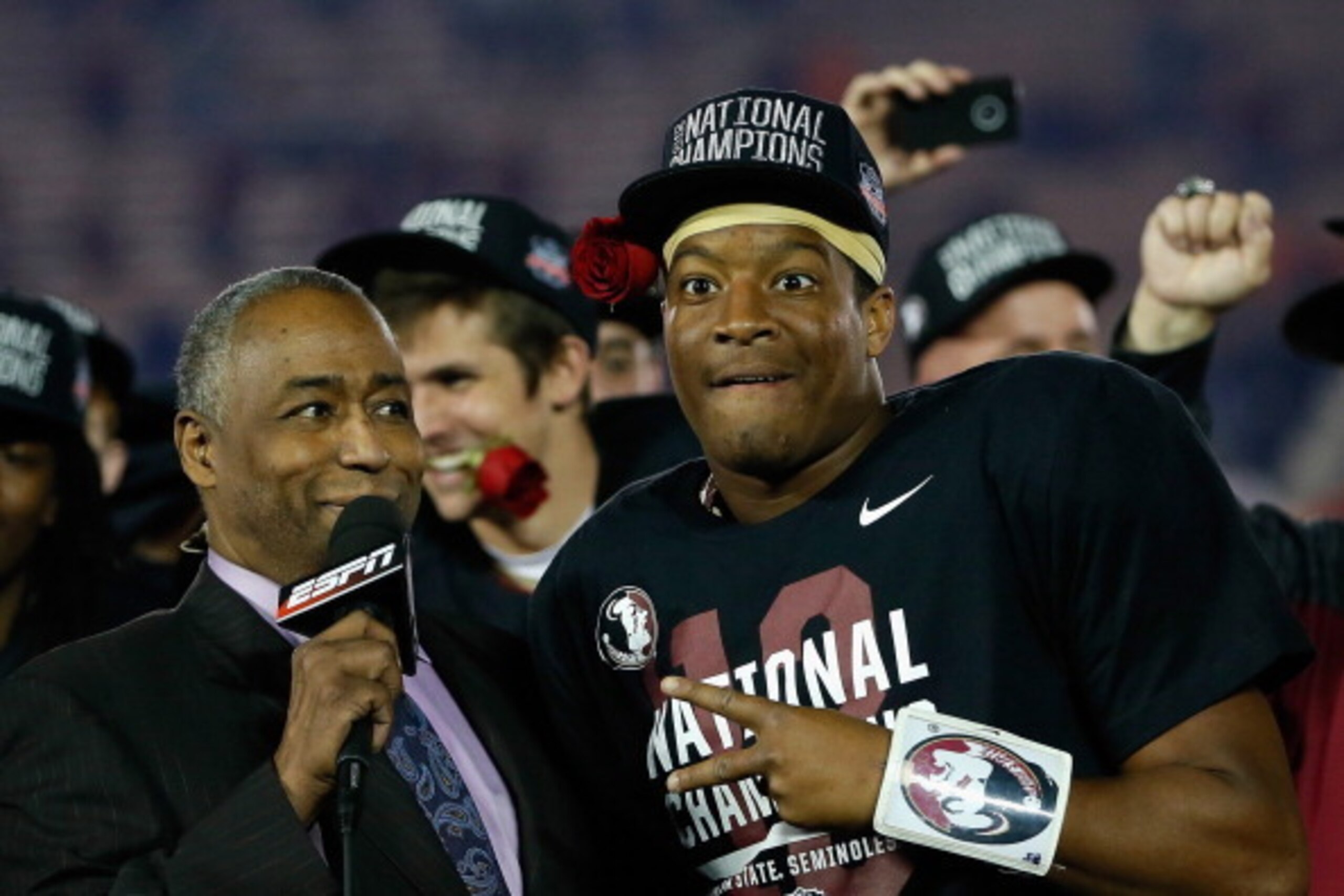 PASADENA, CA - JANUARY 06: Quarterback Jameis Winston #5 of the Florida State Seminoles is interviewed onstage by ESPN's John Saunders after defeating the Auburn Tigers 34-31 in the 2014 Vizio BCS National Championship Game at the Rose Bowl on January 6, PASADENA, CA - JANUARY 06: Quarterback Jameis Winston #5 of the Florida State Seminoles is interviewed onstage by ESPN's John Saunders after defeating the Auburn Tigers 34-31 in the 2014 Vizio BCS National Championship Game at the Rose Bowl on January 6,