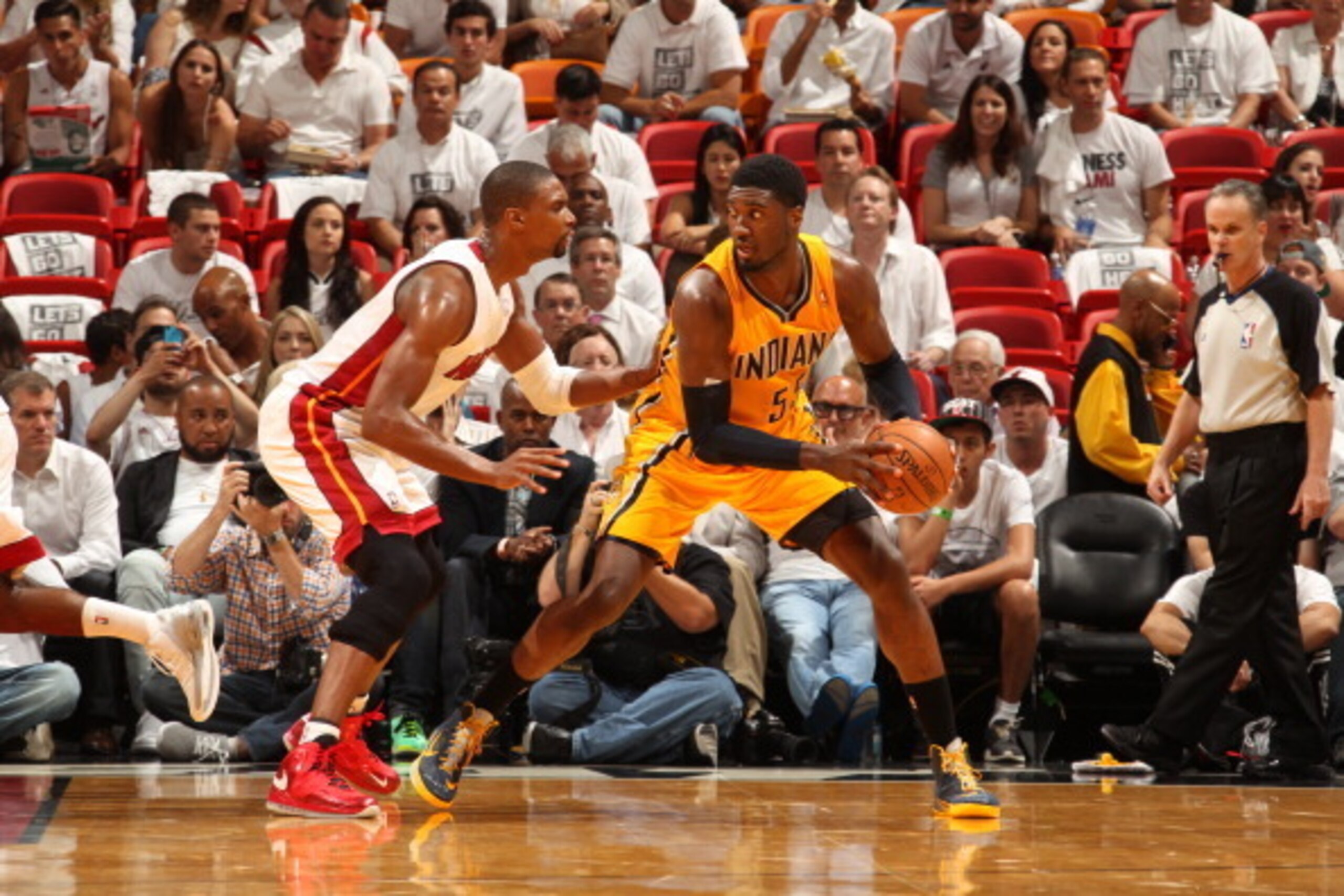 MIAMI, FL - MAY 30: Roy Hibbert #55 of the Indiana Pacers handles the ball against Chris Bosh #1 of the Miami Heat in Game Six of the Eastern Conference Finals during the 2014 NBA Playoffs on May 30, 2014 in Miami, Fl. NOTE TO USER: User expressly acknowl
