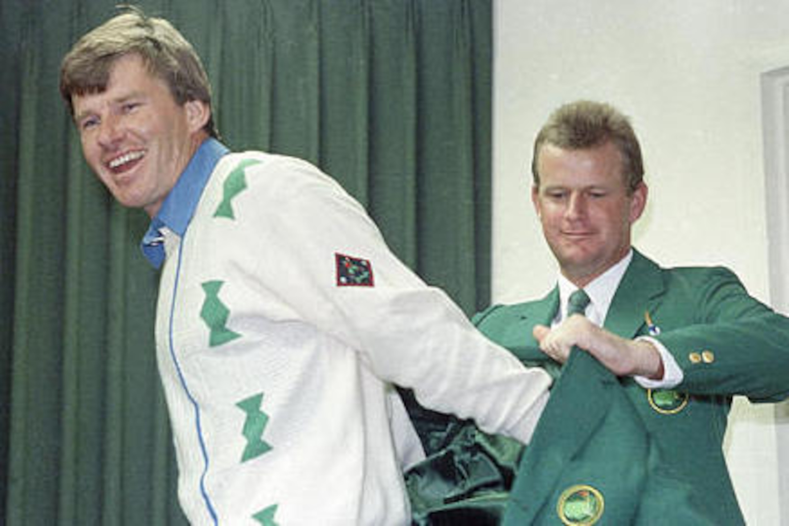 Nick Faldo getting green jacket from Sandy Lyle