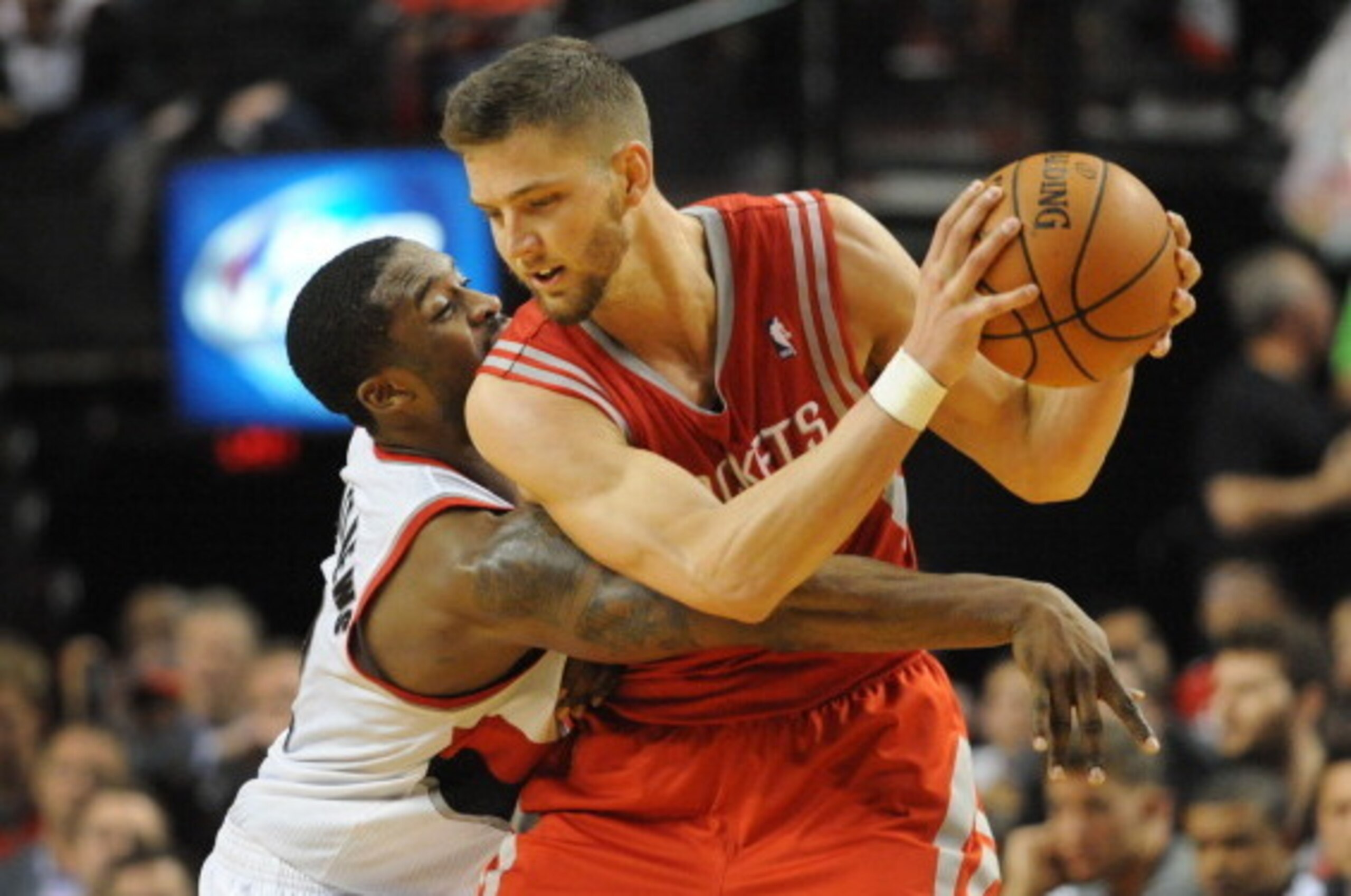 PORTLAND, OR - APRIL  27: Wesley Matthews #2 of the Portland Trail Blazers reaches in on Chandler Parsons #25 of the Houston Rockets in the fourth quarter of Game Four of the Western Conference Quarterfinals during the 2014 NBA Playoffs at the Moda Center