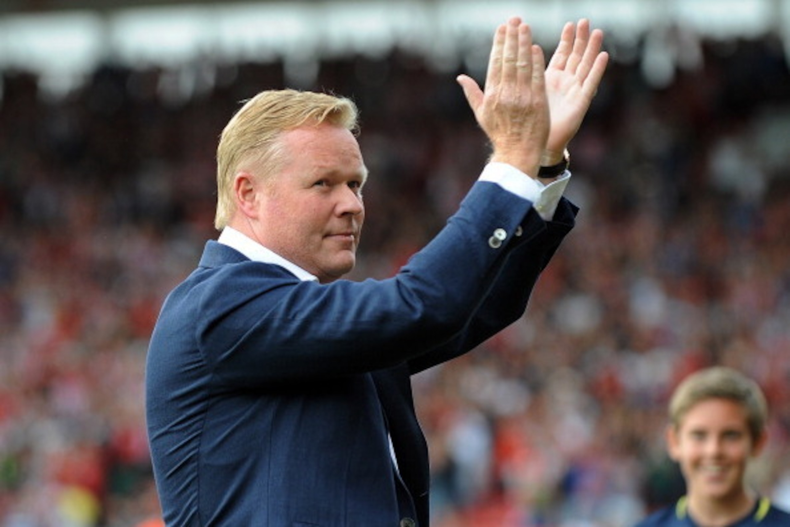 SOUTHAMPTON, ENGLAND - AUGUST 09: Southampton Manager Ronald Koeman waves to the fans before the start of the pre season friendly match between Southampton and Bayer Leverkusen at St Mary's Stadium on August 9, 2014 in Southampton, England. (Photo by Robi SOUTHAMPTON, ENGLAND - AUGUST 09: Southampton Manager Ronald Koeman waves to the fans before the start of the pre season friendly match between Southampton and Bayer Leverkusen at St Mary's Stadium on August 9, 2014 in Southampton, England. (Photo by Robi